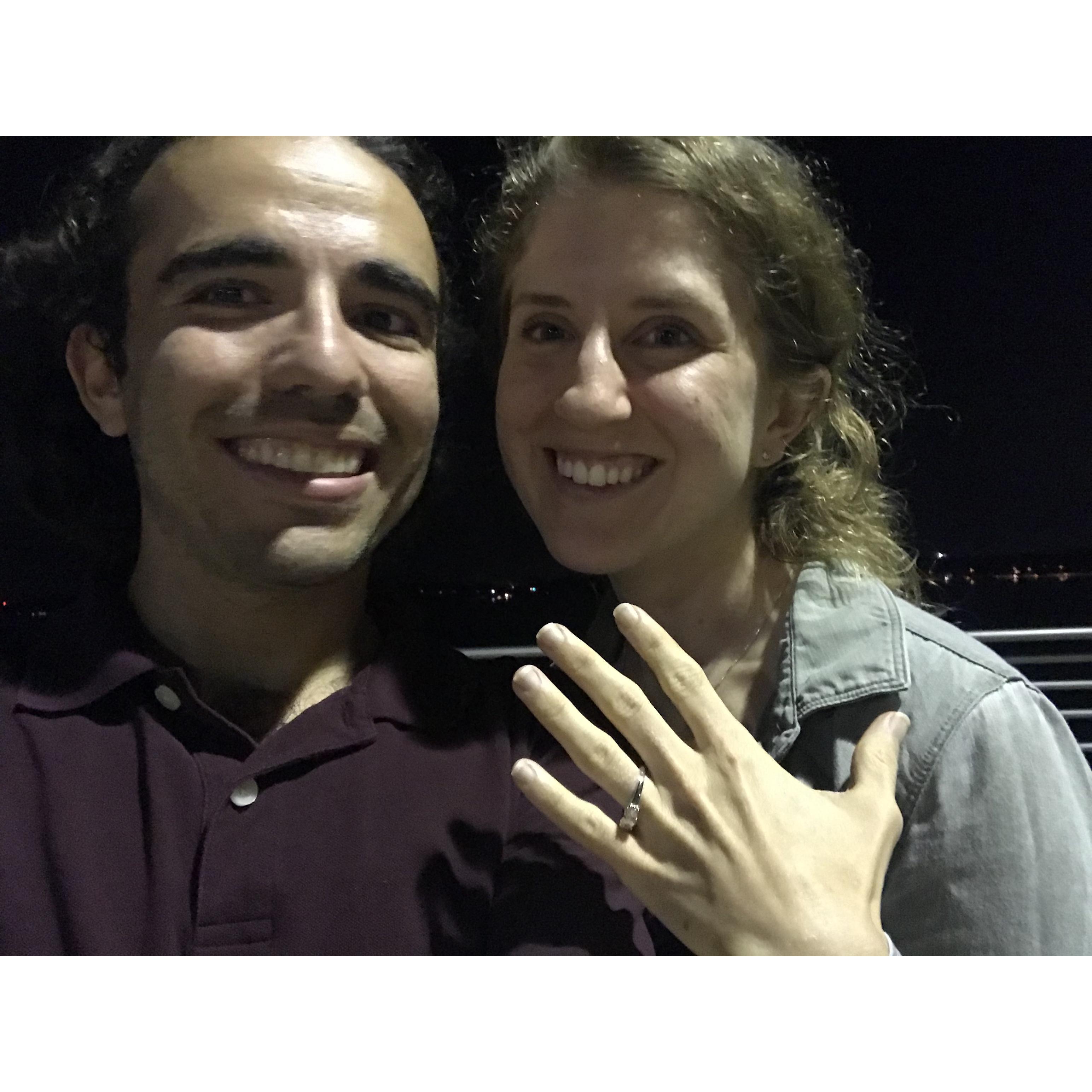 Harris and Katie right after the proposal happened on the Monona terrace in Madison (the same spot where they shared their first kiss).