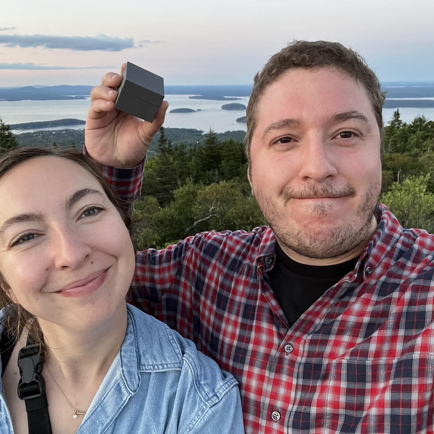 The second before Leo surprised Jackie by proposing at Cadillac mountain at sunset - 2023 (our third year in Acadia)