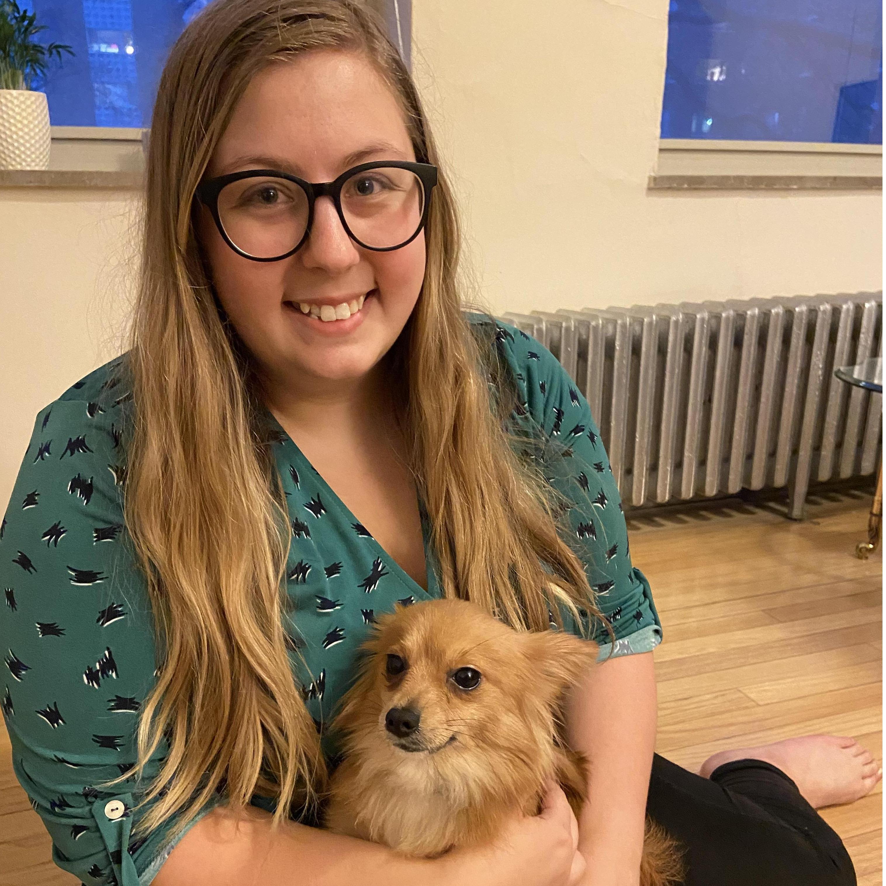 Bridget holding Noodle on the day she was adopted.