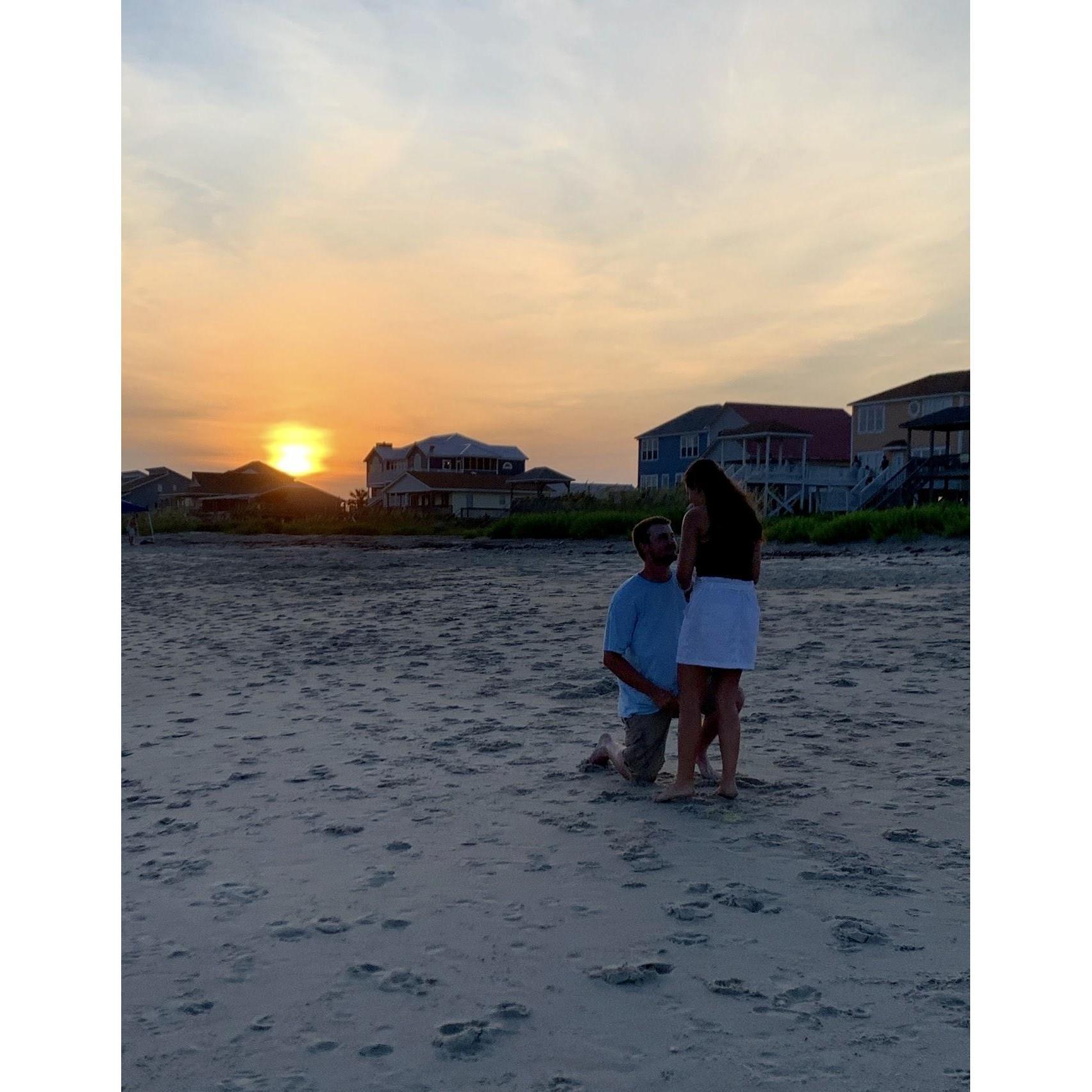 A stranger actually took this picture of Jared proposing on the beach! This will always be one of the happiest moments of both of our lives.
