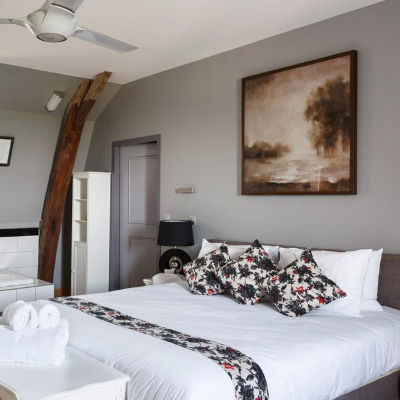 Beautifully renovated bedrooms with modern interior design and king-size beds
