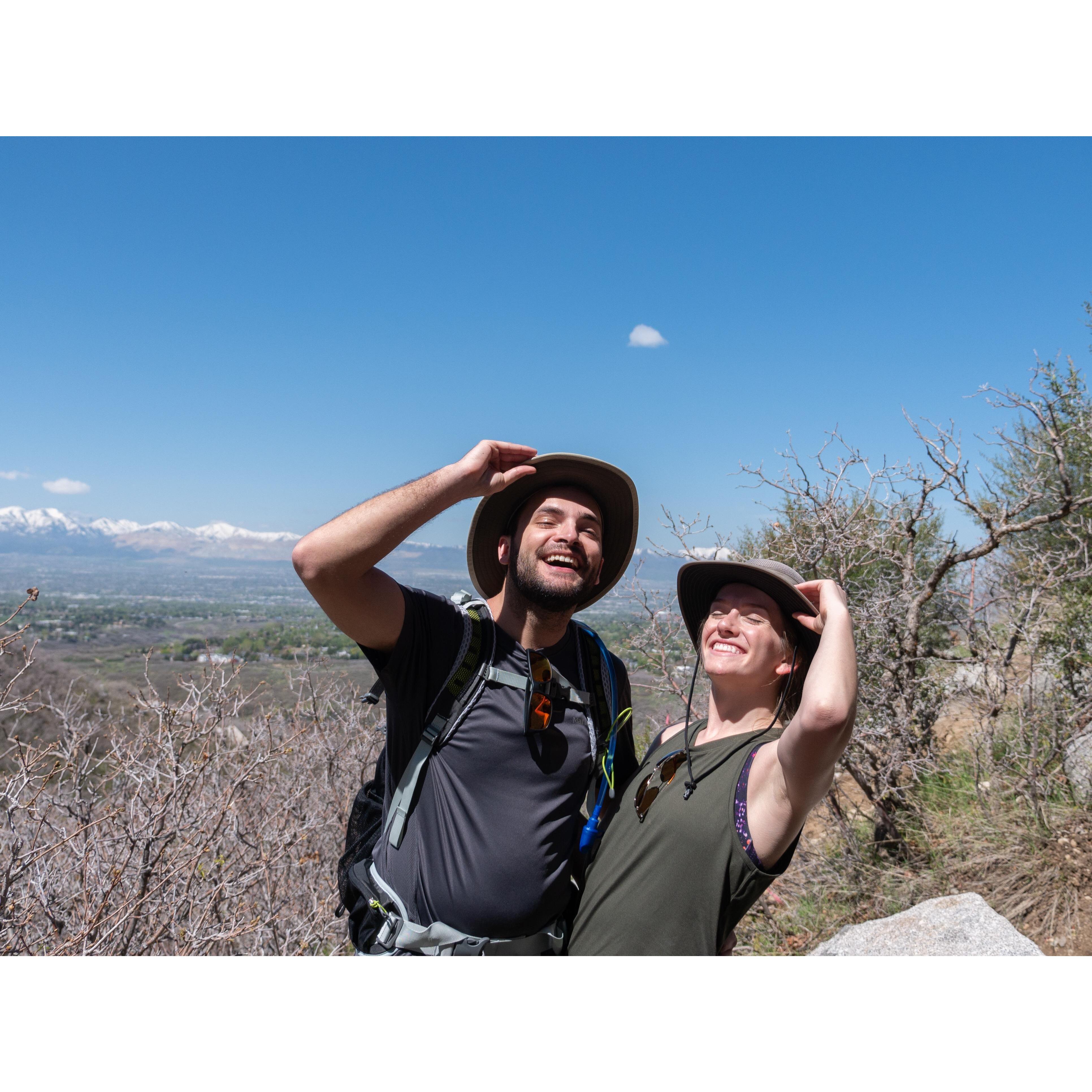 Trying to get our faces out of the shadows for a picture on a hike in Salt Lake