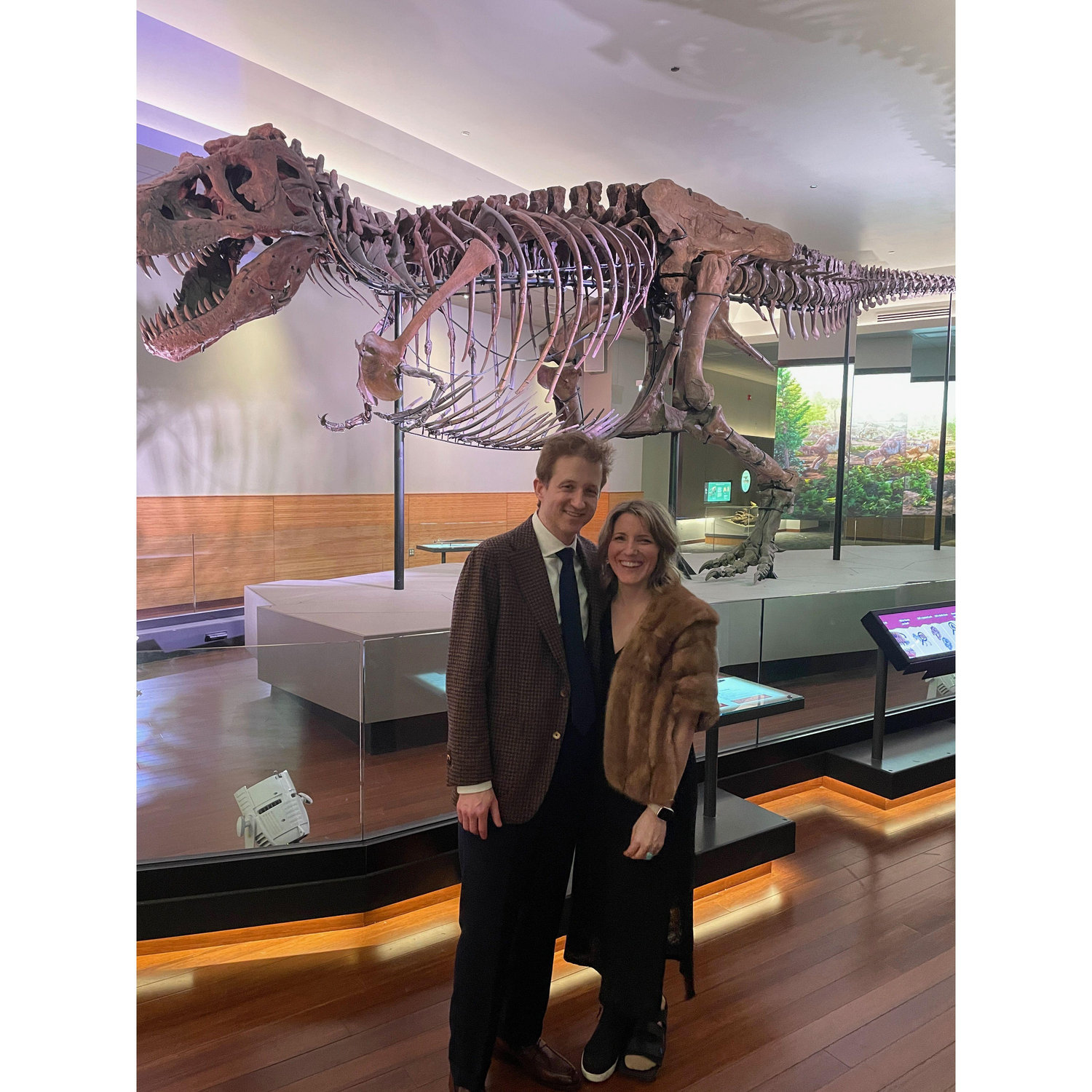 Taken in April 2025 at a charity gala at the Field Museum as Sue, the T. rex looks on. It was the perfect opportunity to don the fur stole that belonged to Emily's late grandmother, Rose Mary Dunn.
