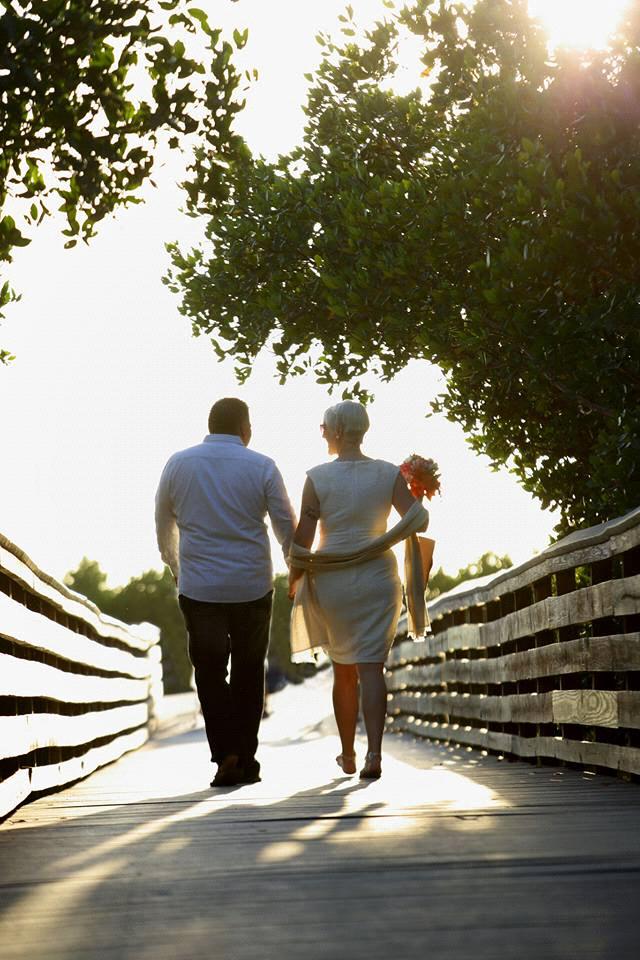 Walking to our ceremony on the beach at Lover's Key