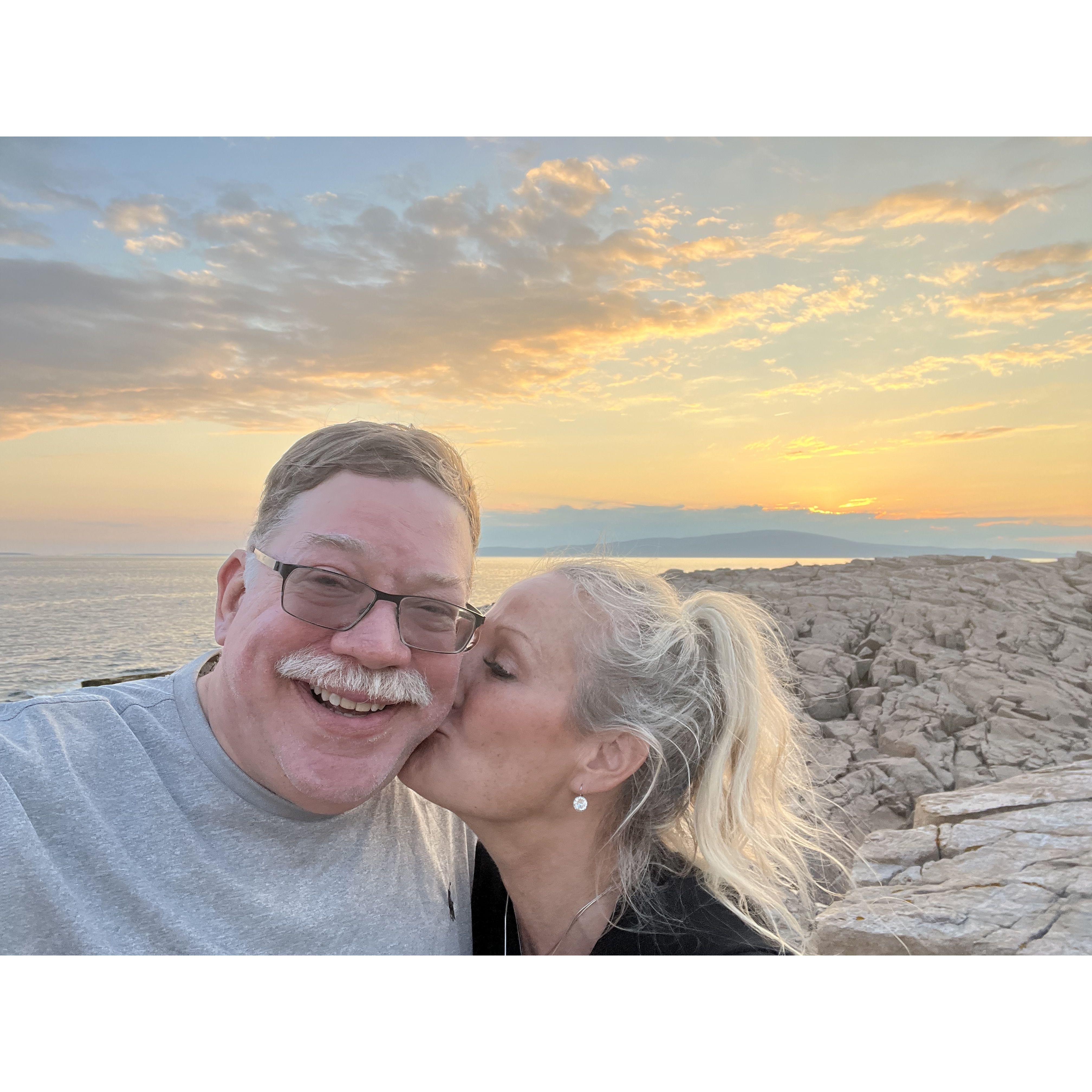 A kiss at sunset on the Schoodic peninsula in Maine.