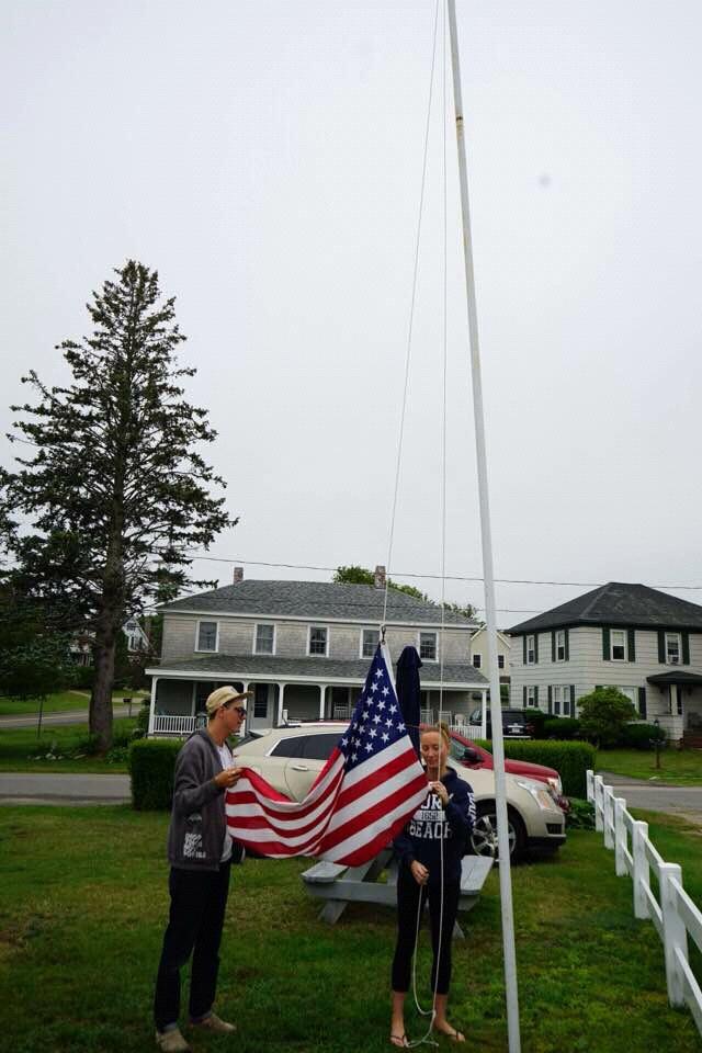 DYLAN AND MEGAN ATTENDING TO THEIR GRANDPARENTS FLAG IN MAINE.