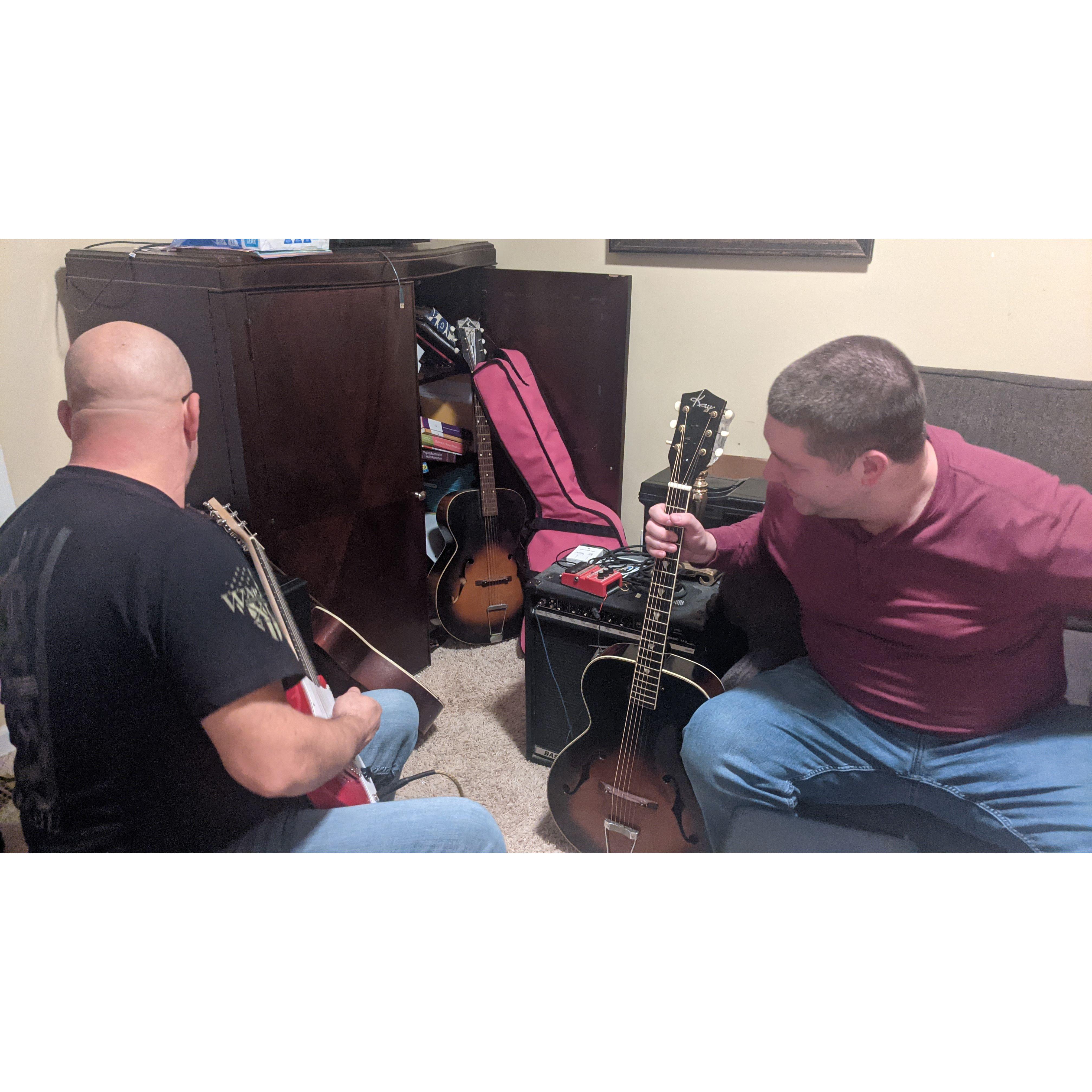 Danny & Ian playing with guitars