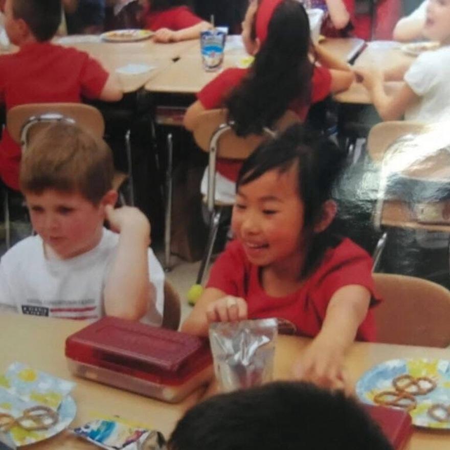 Here’s a picture of Kyle and Kelly at one of their class parties in first grade! Kelly’s probably talking his ear off!