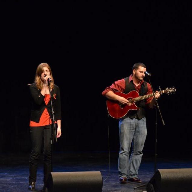 Performing together for an SAI benefit concert.