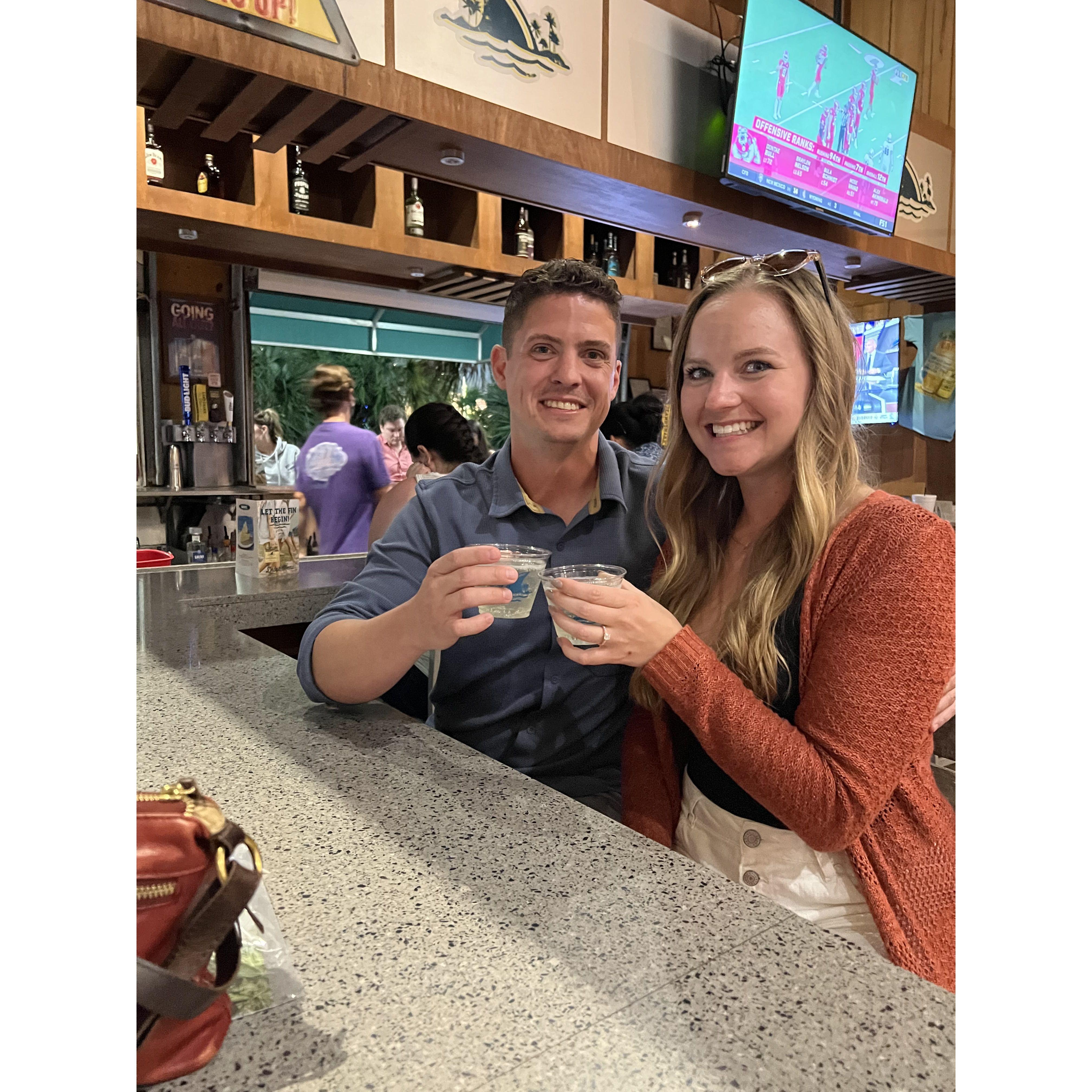 Cheersing with our plastic cups of champagne! Yay! At the Landshark Bar and Grill, Myrtle Beach, SC