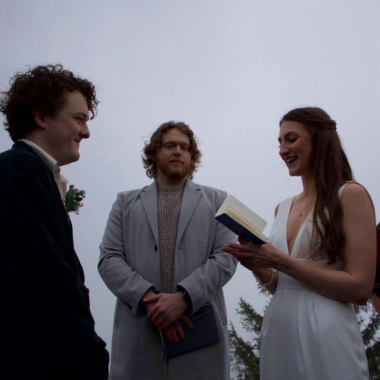 Ash reading her vows