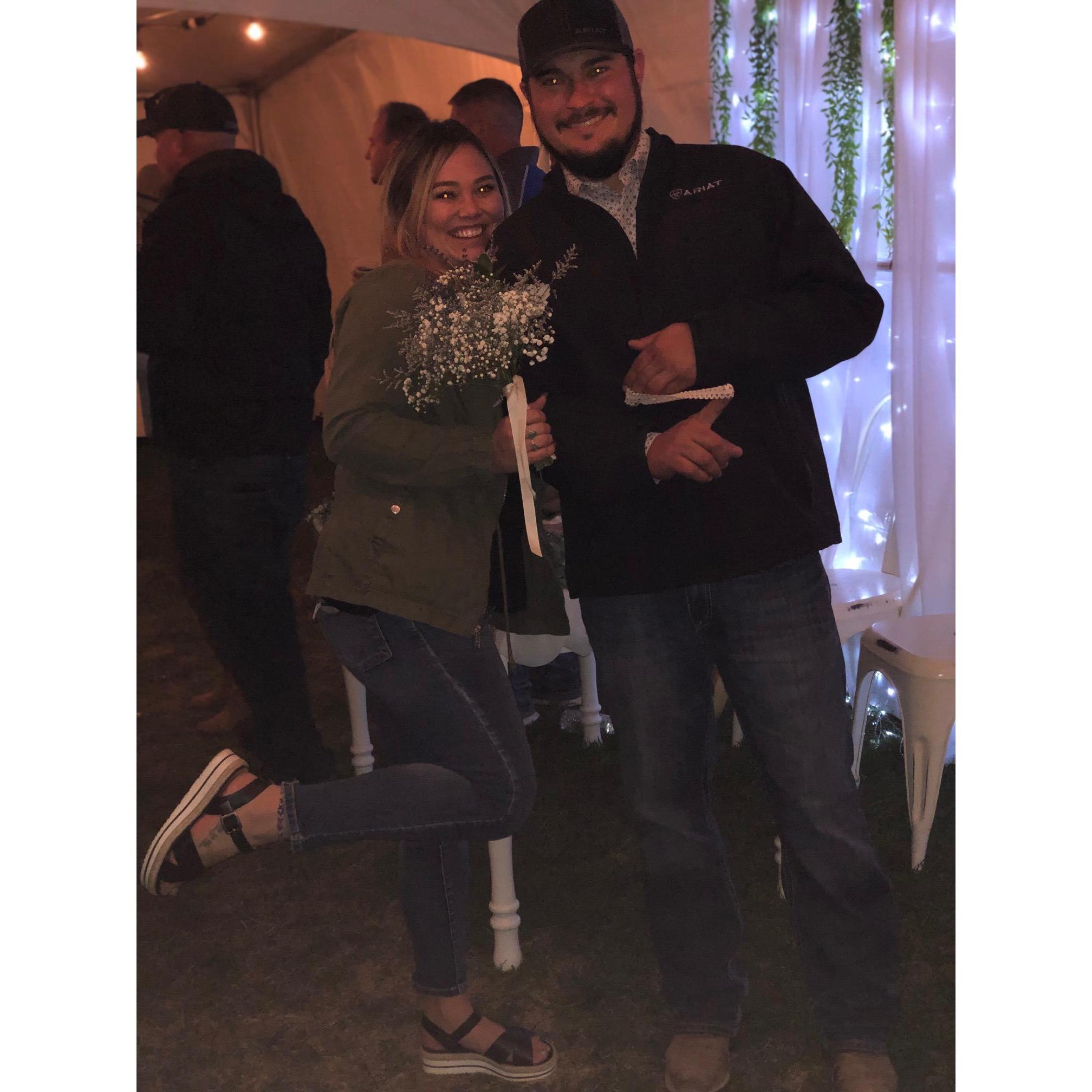 We caught the bouquet and garter at our friends wedding and now we are getting married one year later!! All smiles!!