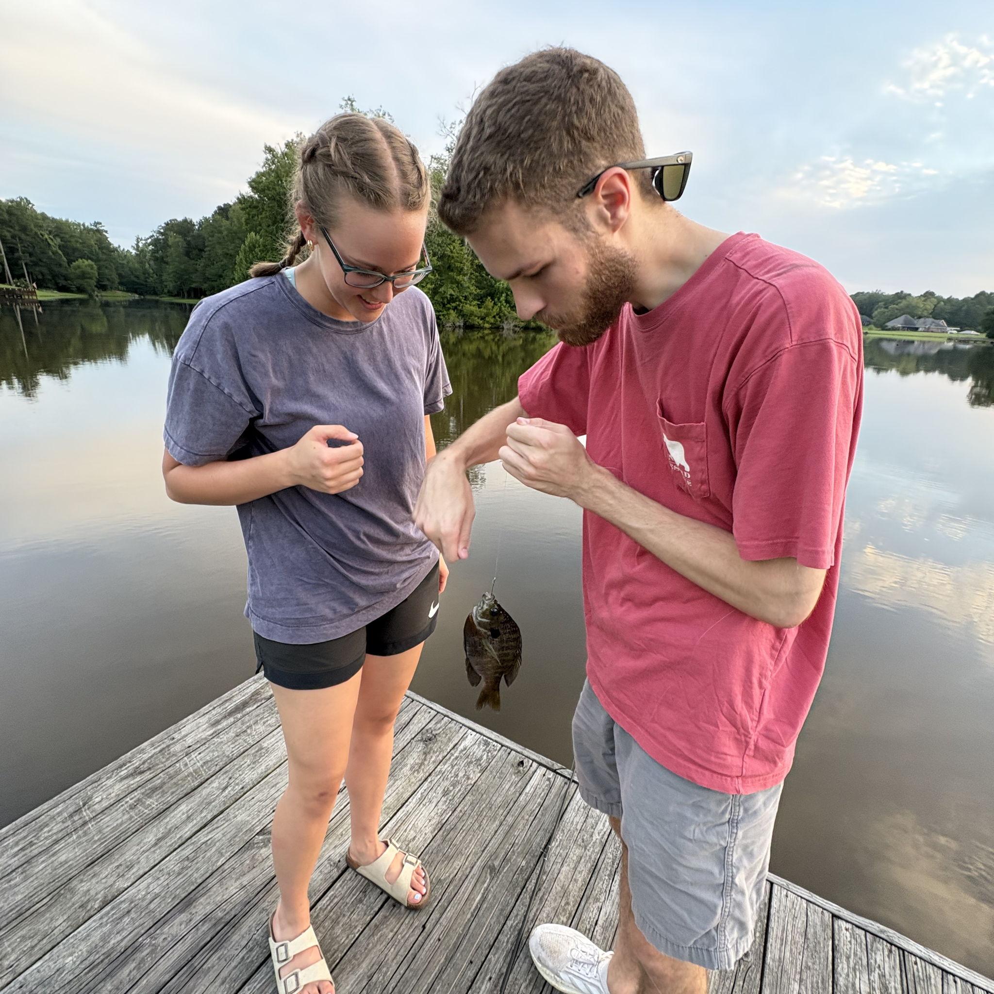 Fishing in Mississippi. Aimee was very nervous to take the hook out.