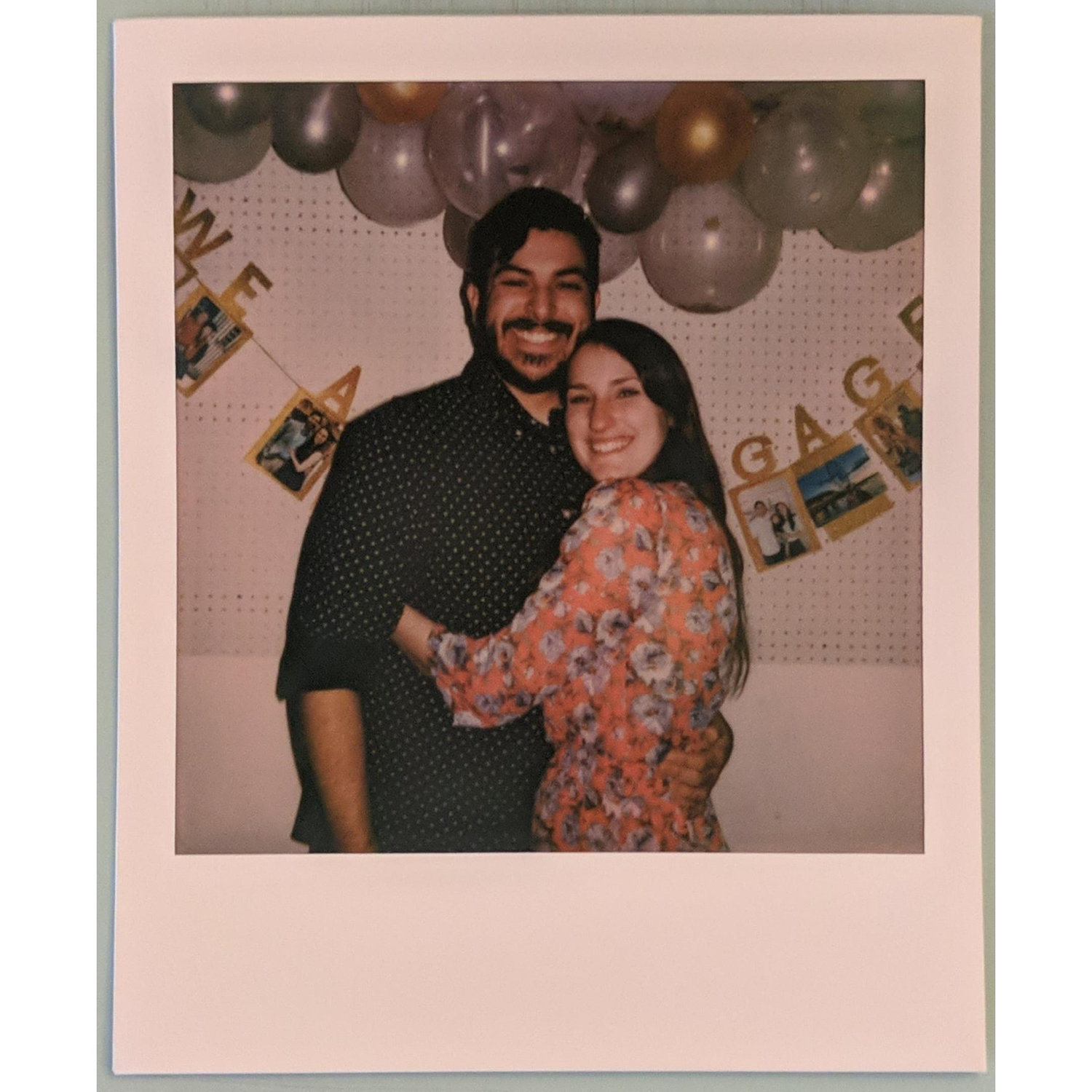 Engagement party polaroid