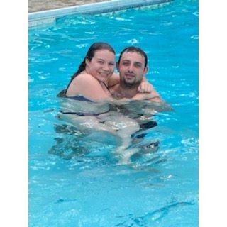 Right before this picture, Vinny held Nikki over his head and dropped her into the water.