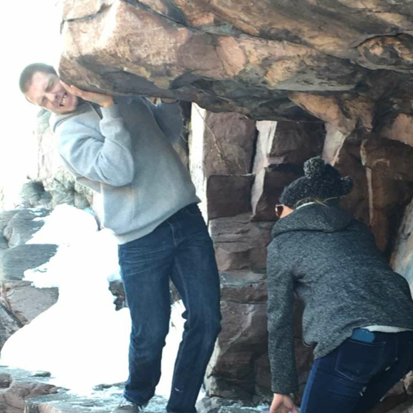 Robert being a dork and Cheyenne climbing up to join him.