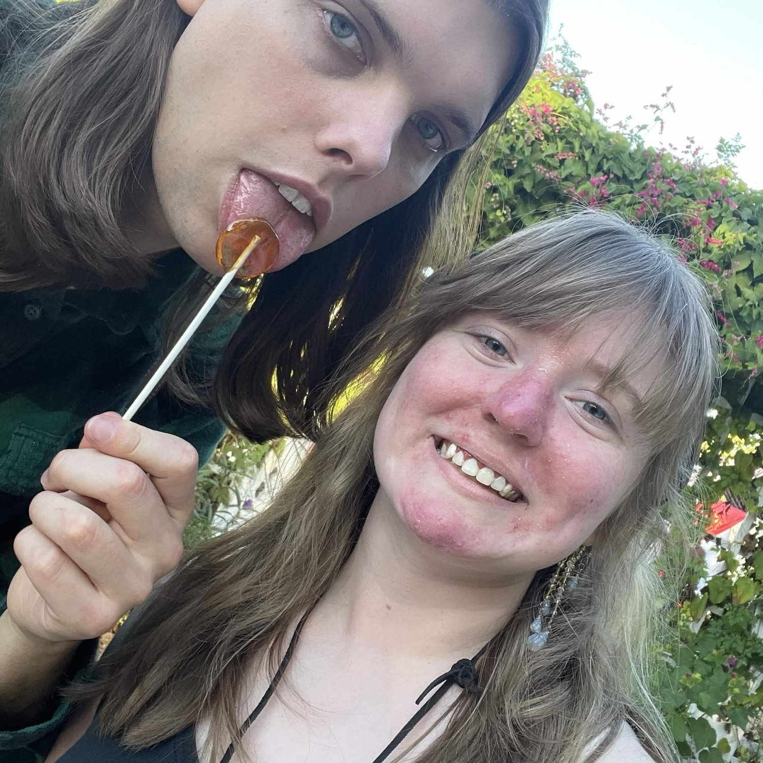 Our first ren faire together. Atlas had to keep their tattoo covered and Moth really liked that lollipop. It was honey.