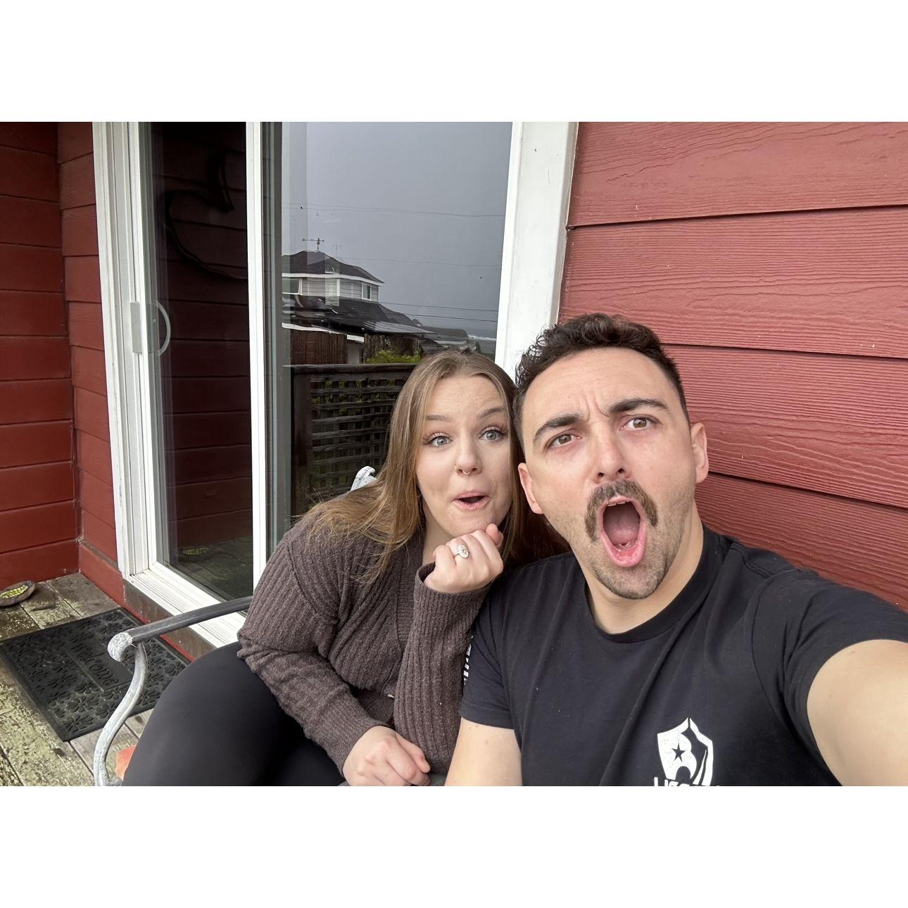Right after Chris proposed on the beach. A bug flew on his phone right when we snapped the photo.