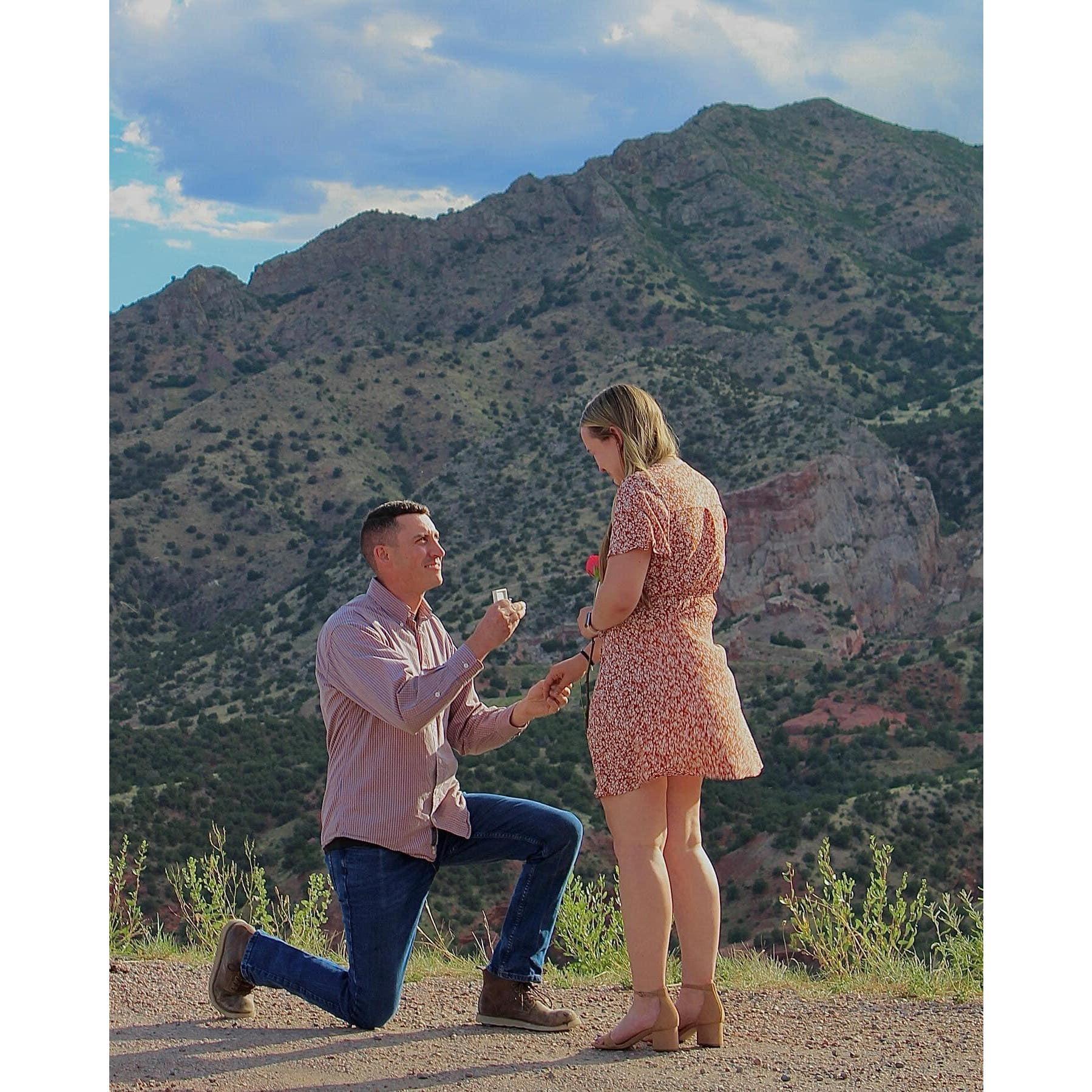 Our proposal on Skyline Drive after Evan send Joanna on a Taylor Swift themed scavenger hunt around Cañon City!