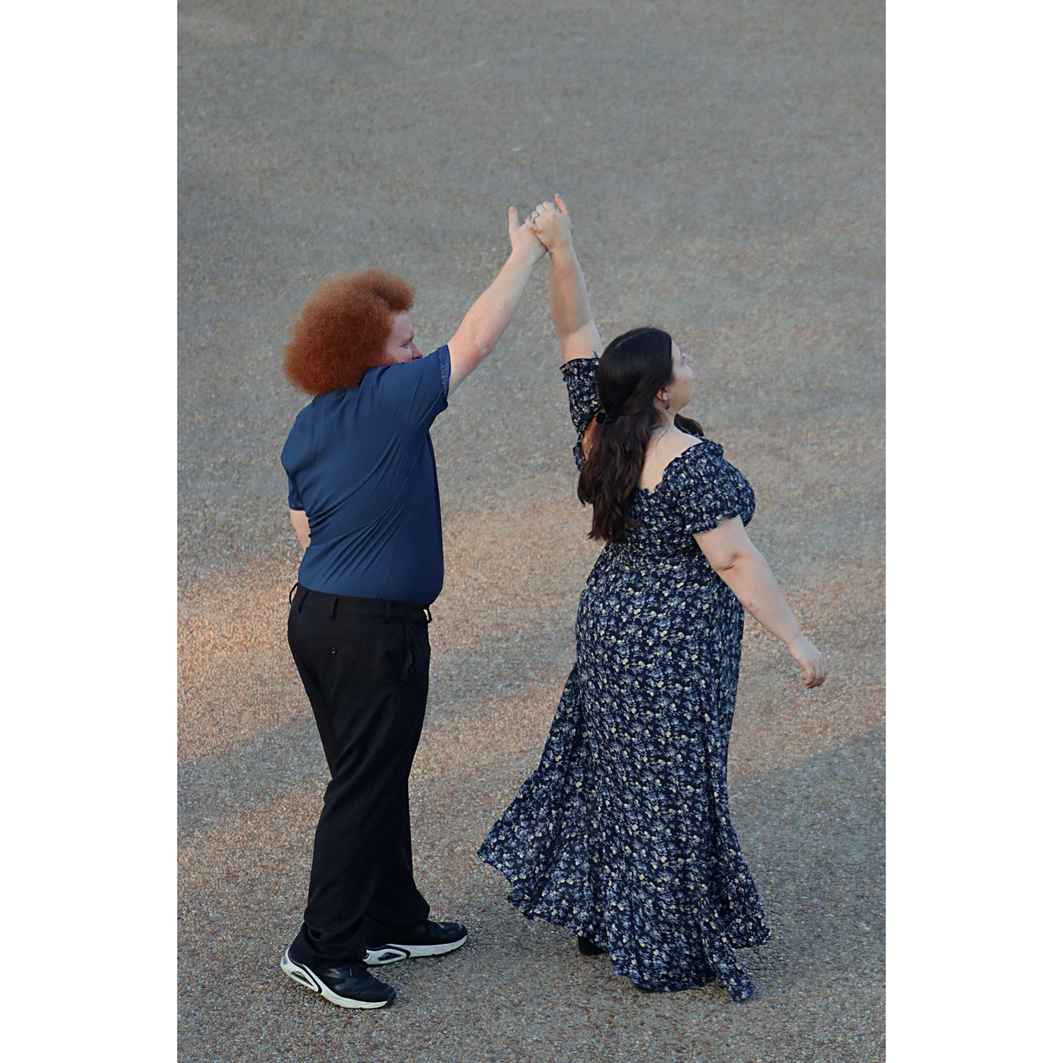 When our photographer asked us to dance and twirl, I (Kalina) could not get the hang of it.