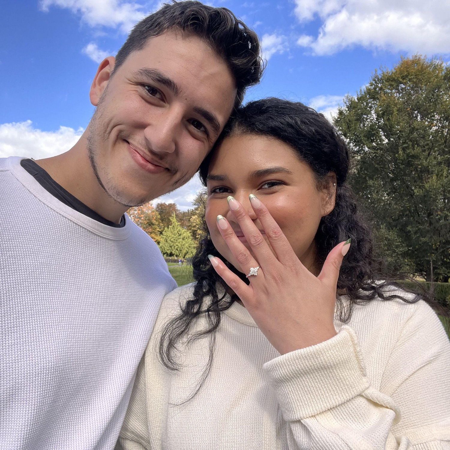 Snapped a quick selfie after she said yes!