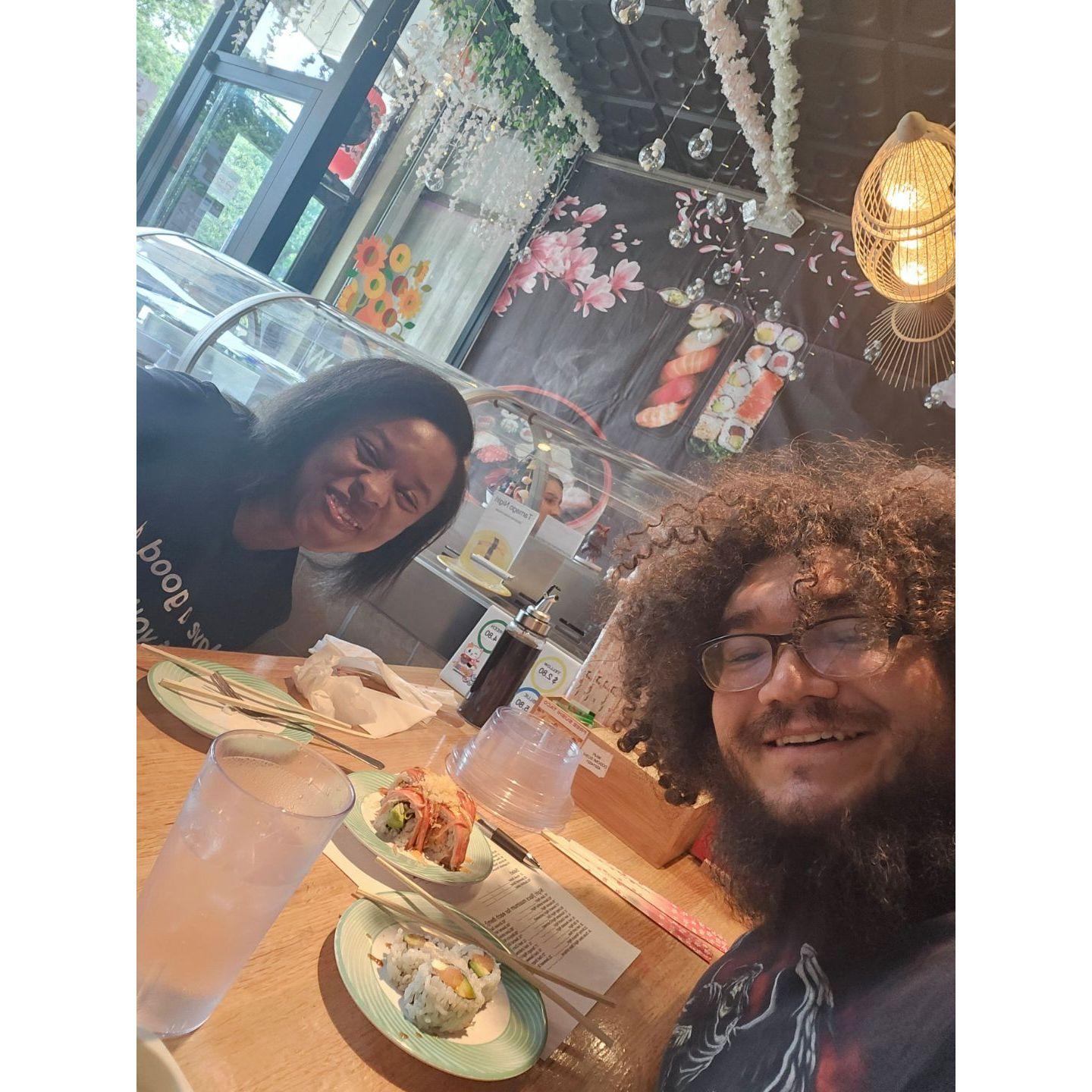 Another photo from our Chicago trip. We were at a Sushi restaurant that had the food delivered on a conveyor belt. We went in during their all you can eat time and both left completely full