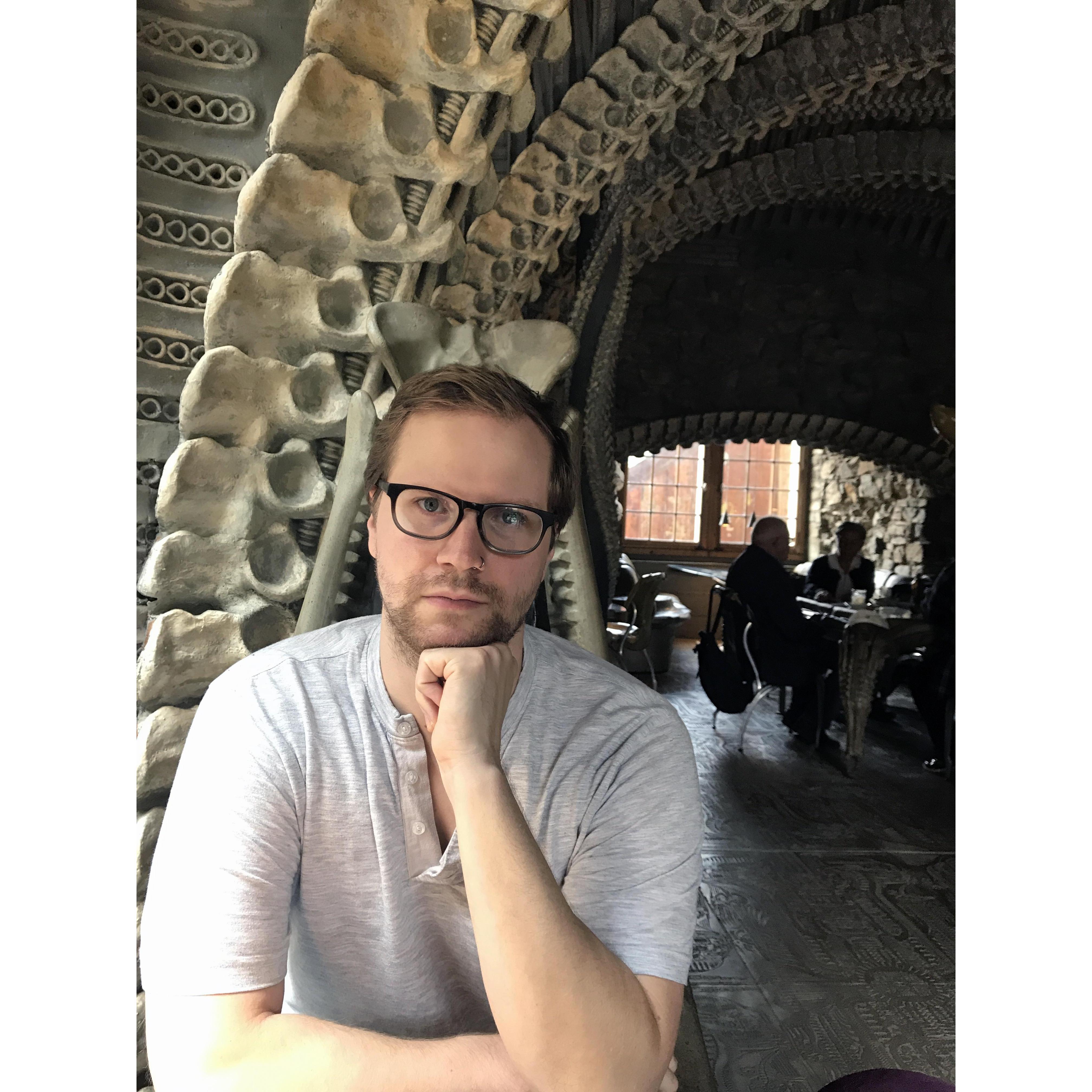 Micah at the H.R. Giger Alien Bar in Gruyères, Switzerland.