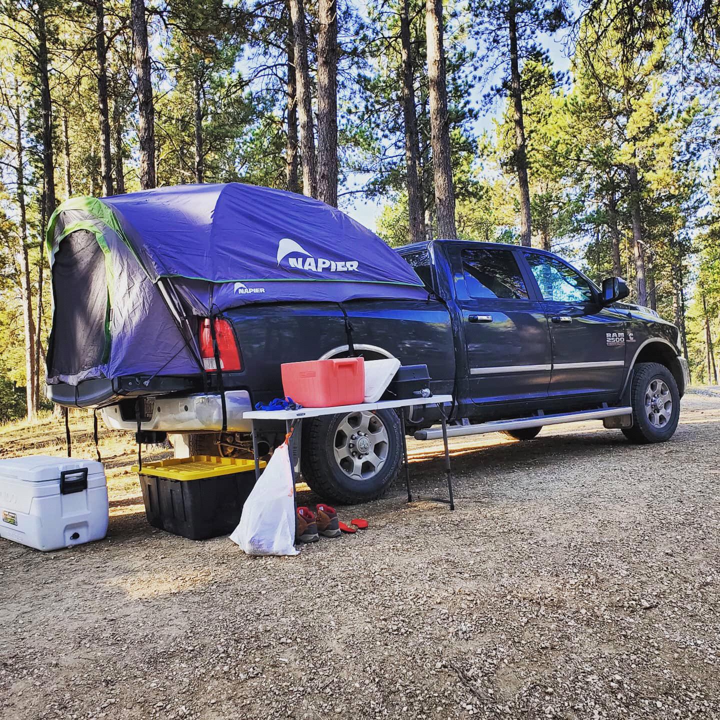 The Fossienda II, Maddie and Paul’s pickup bed tent set up in Custer State Park.