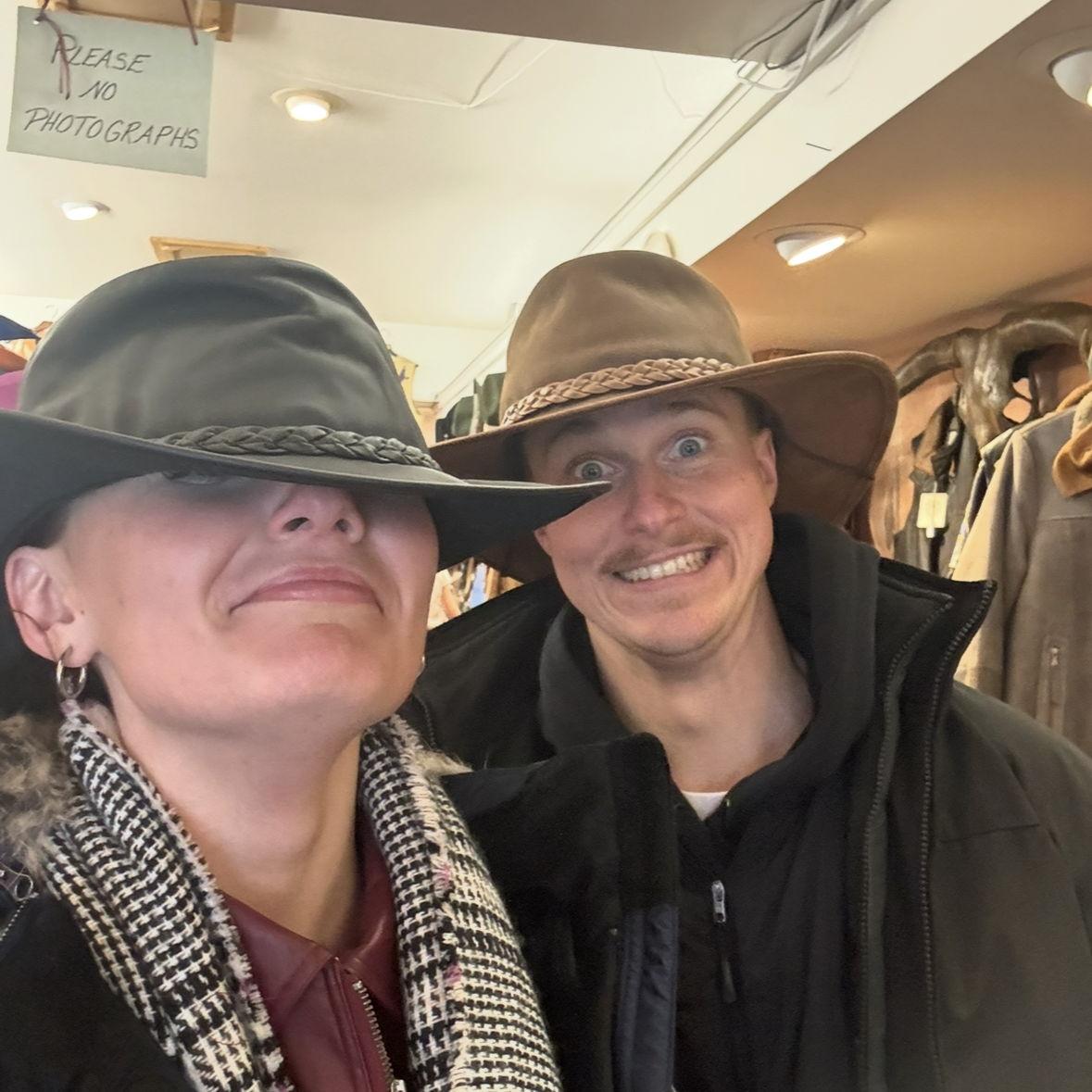 Trying on hats in Wyoming