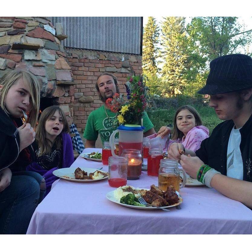 Mother's Day dinner on our back porch... I sure do miss that house. So does everybody else, I think.
