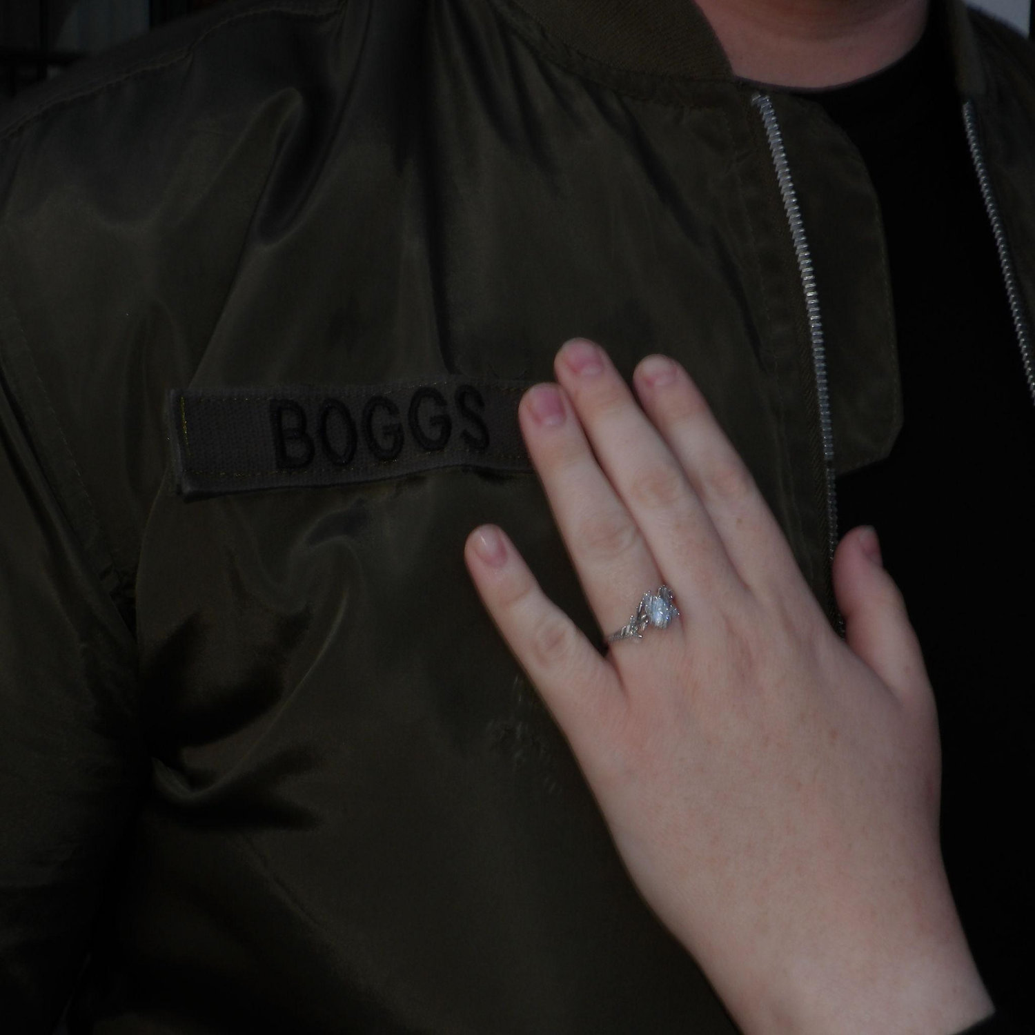 Our new last name next to Kaylie's Engagement Ring