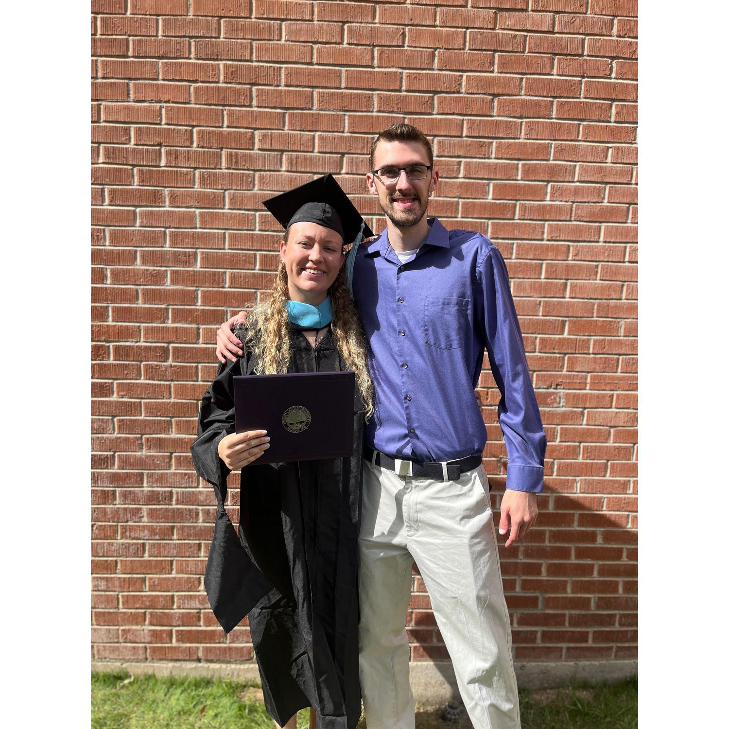 Michaela graduating with her Masters