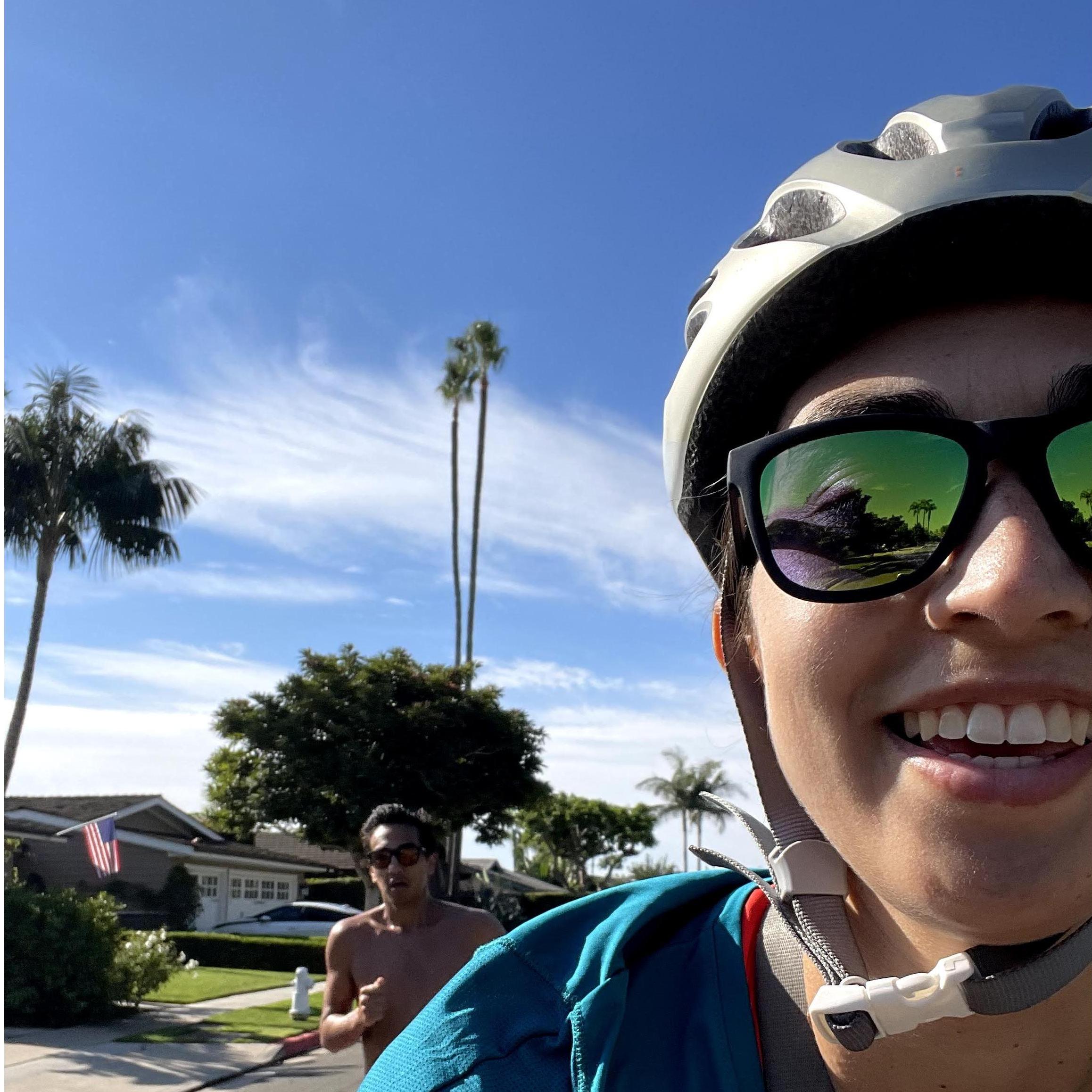 Aaron is a big marathoner and the only way Ceci can keep up is by riding her bike by his side for his long workouts.