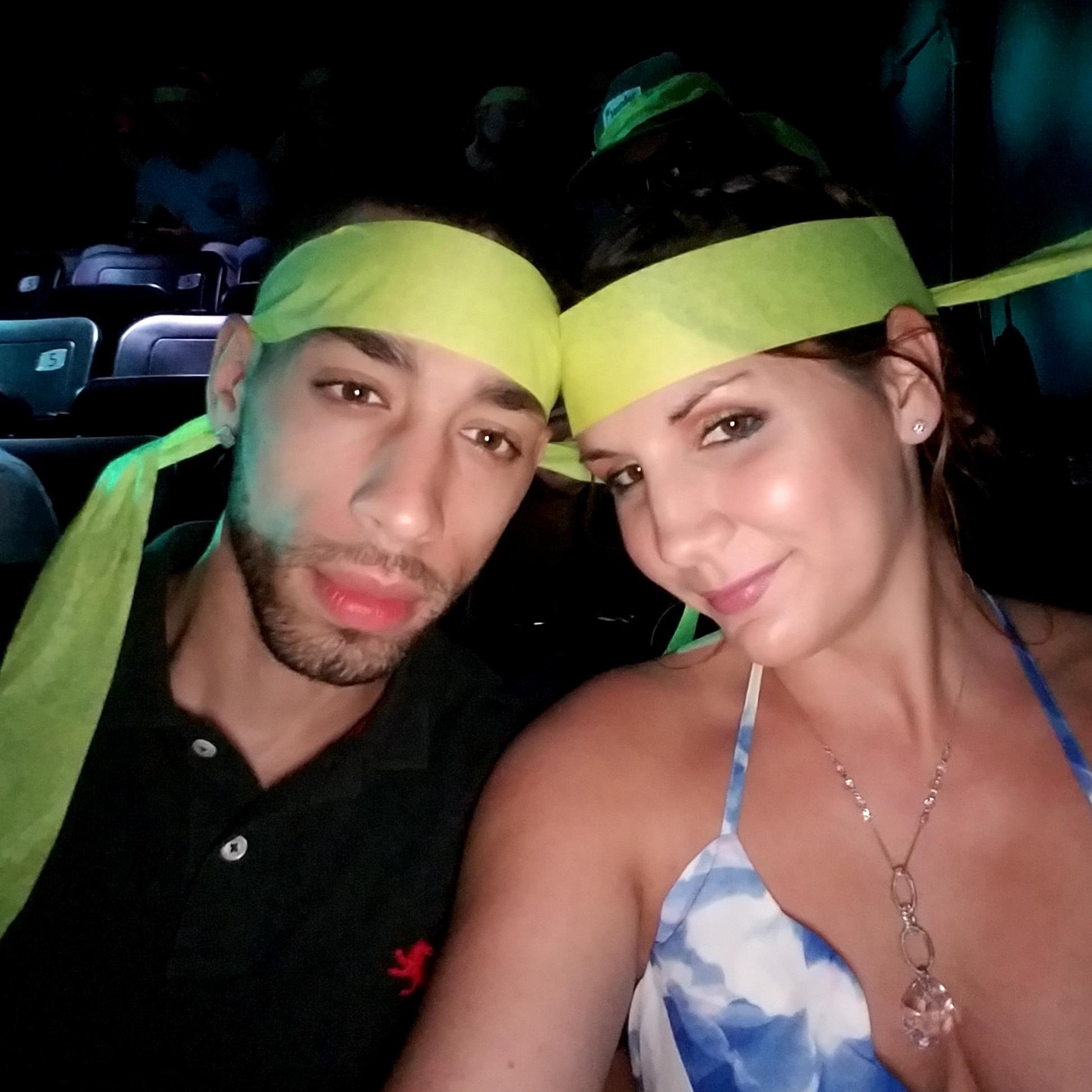 Our 1 year anniversary watching the Blue Man Group. The best part of the show was when they came off stage and picked up a little kids bookbag and threw up in it.