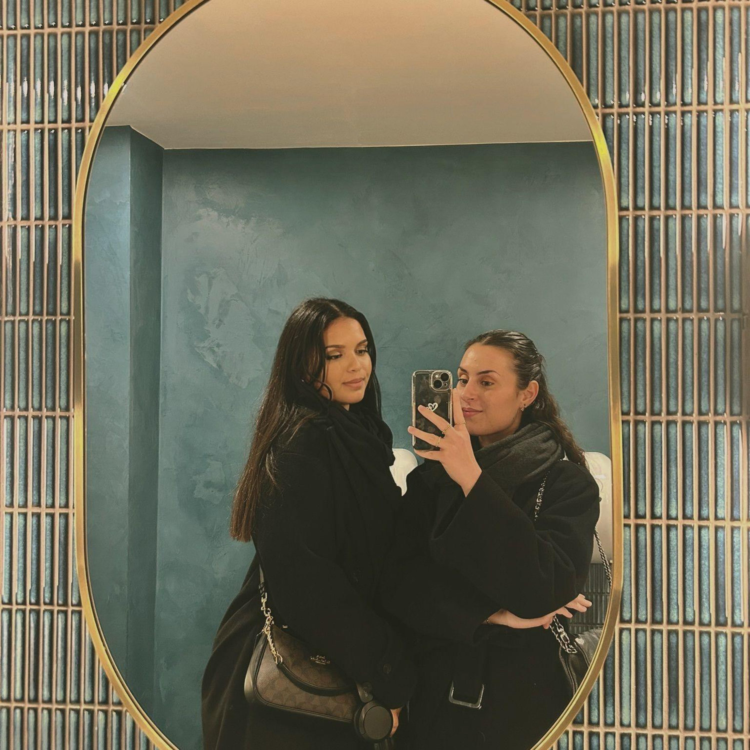 Debbie & her maid of honour, Eloise posing in a toilet (Location: London).
