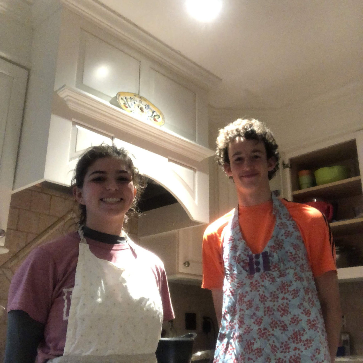 Sam and Luka making Slovenian donuts amidst the Covid Pandemic