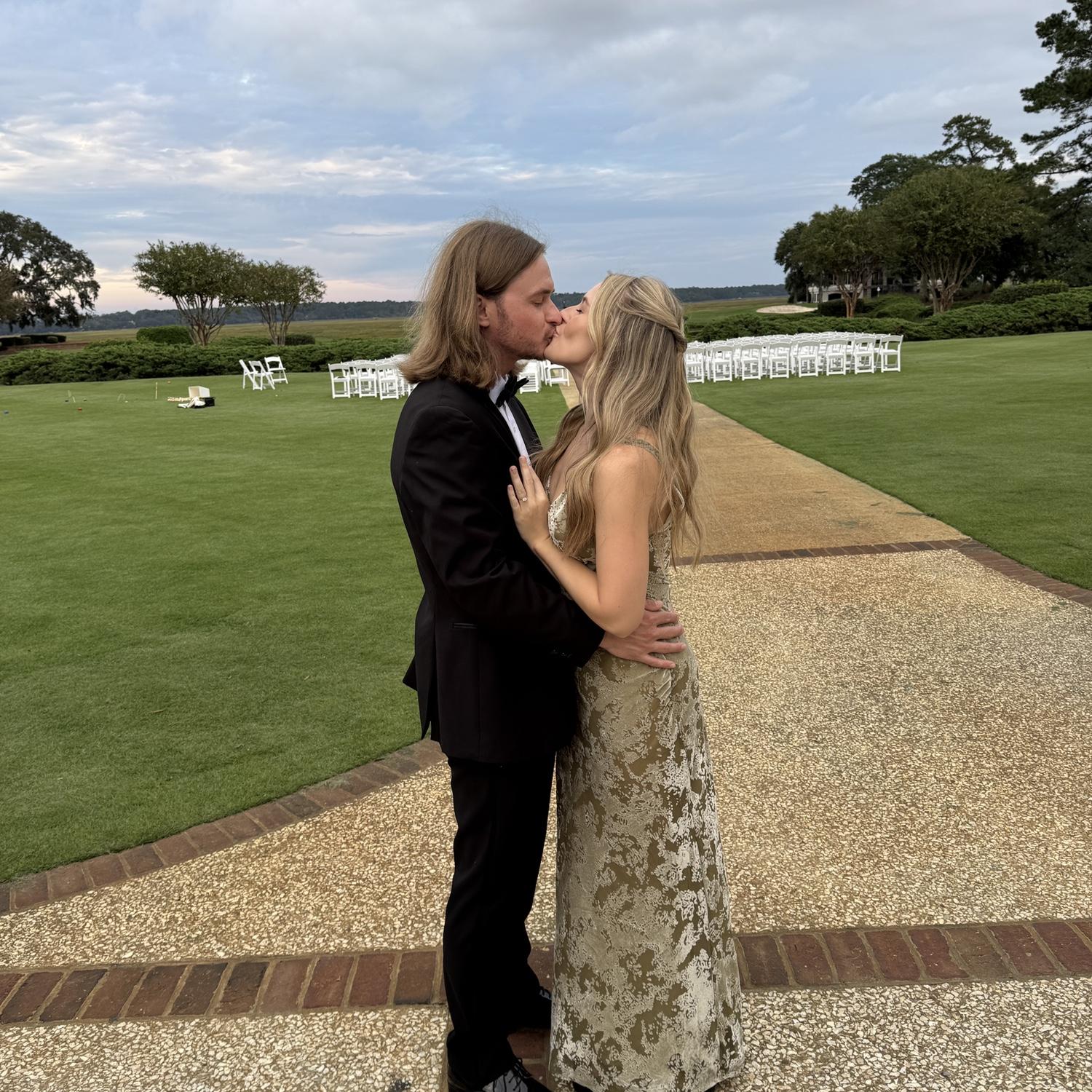 Celebrating Ashley and Kyle at their wedding in 2024