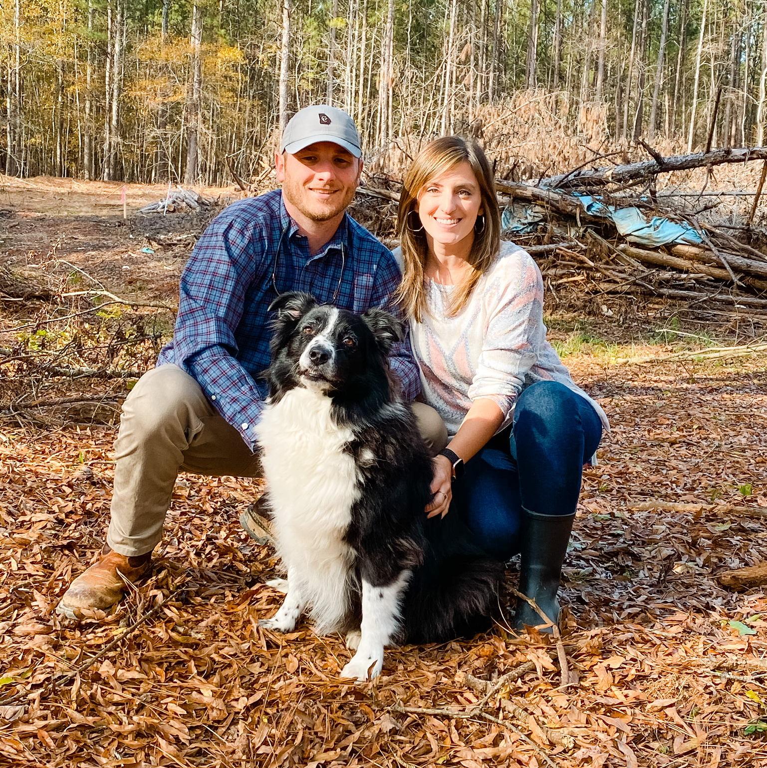 Chad and Anslee with Gracie on the property before any construction had started!