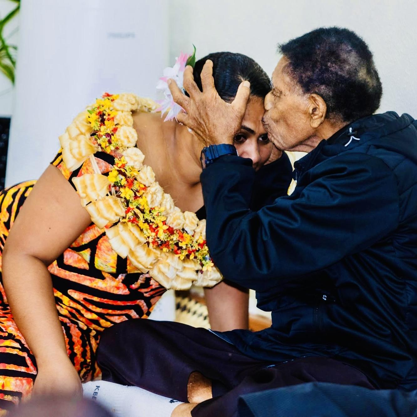 Receiving blessings from Tai
