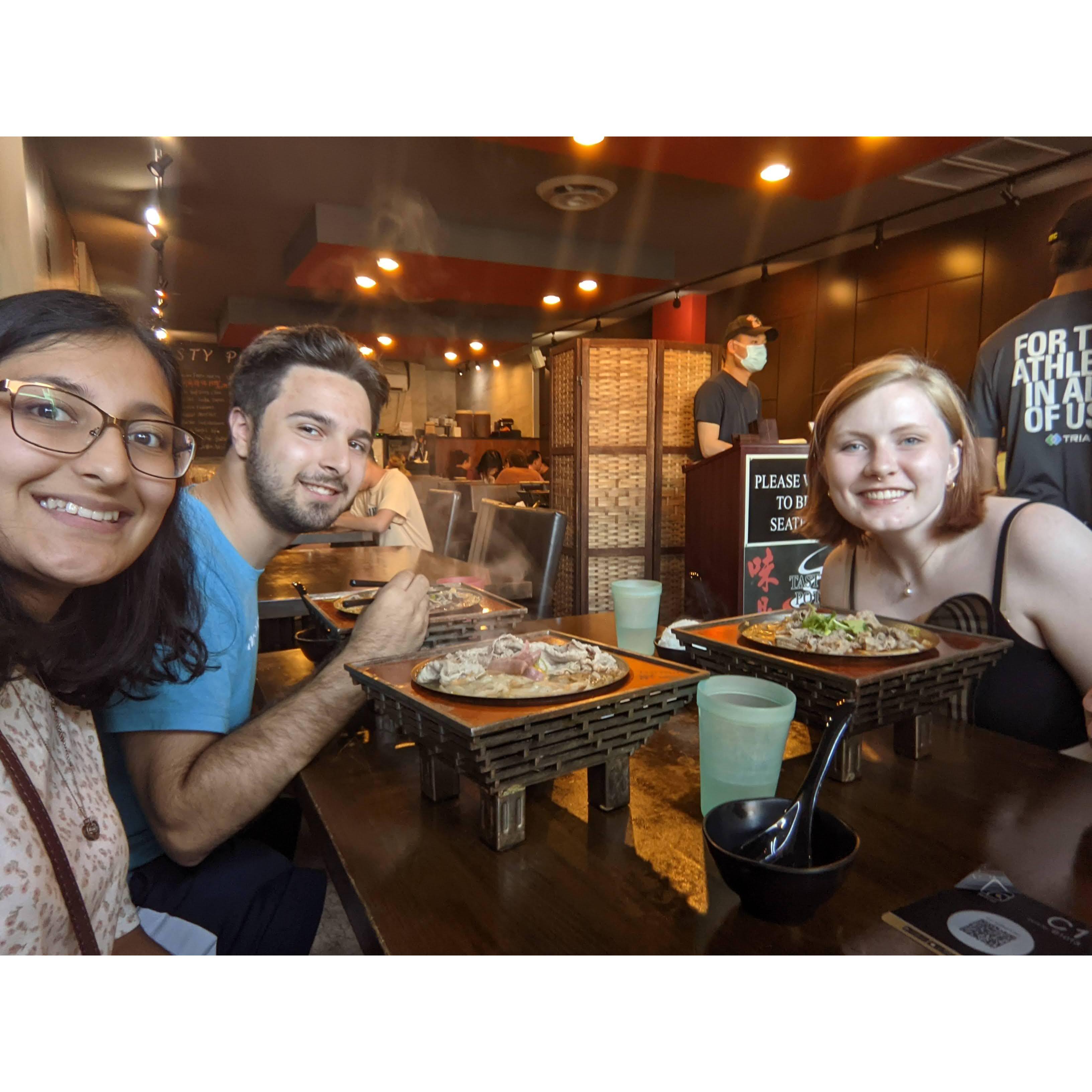 Chris, Sabriyah, and their friend Kalei enjoying hot pot. July 2021, Minneapolis, MN