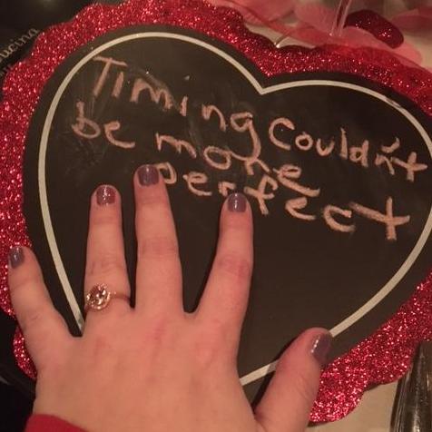 Joel handed me this sign, right before he got on his knee to propose as he played the song "Perfect" by Ed Sheeran.