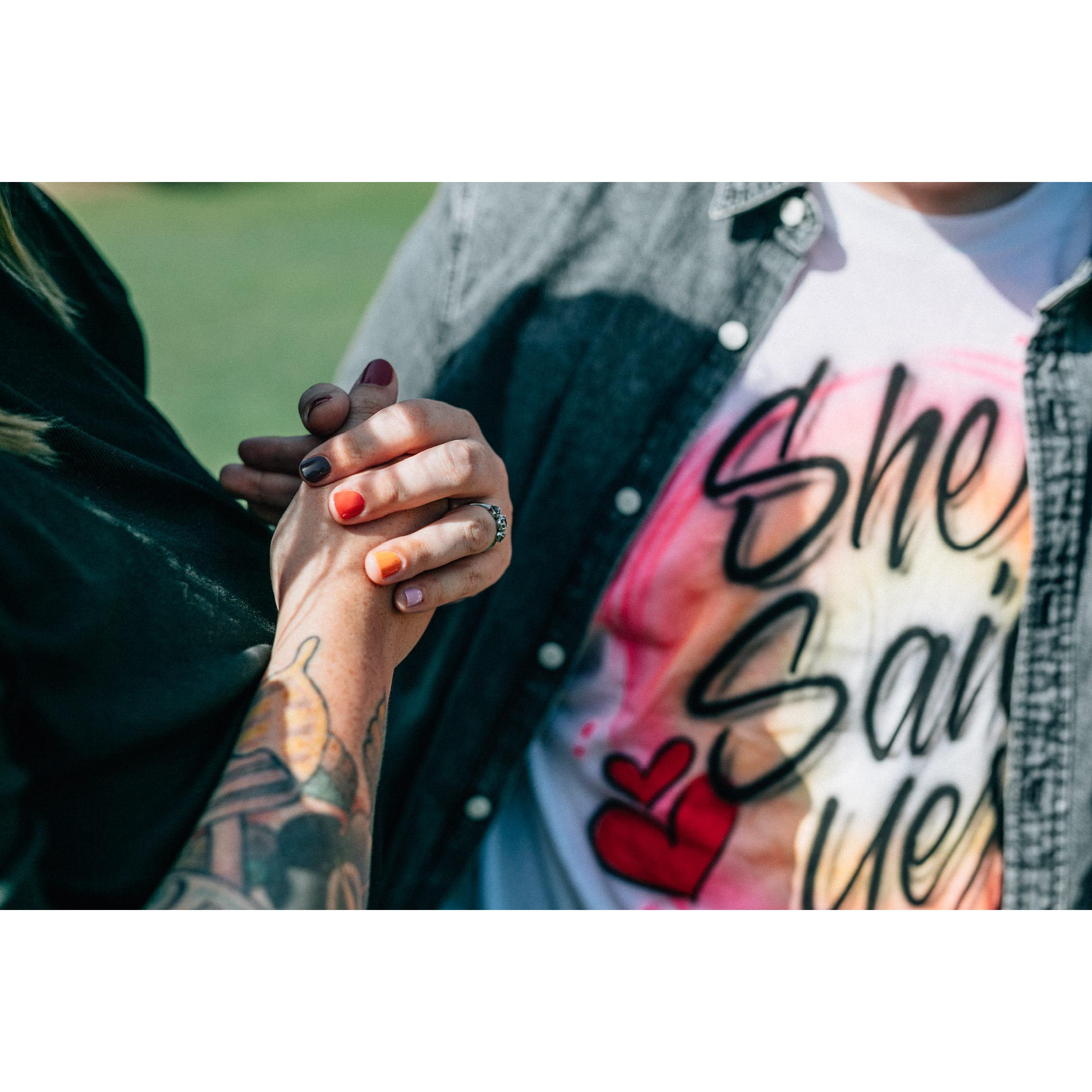 Max's airbrushed shirt was a hilarious surprise underneath their button down that they revealed after they proposed!