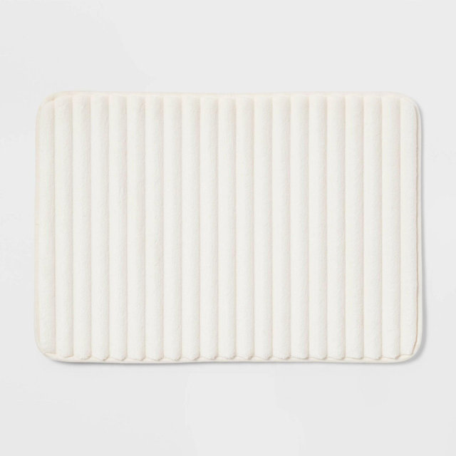 17"x24" Ribbed Cushion Foam Bath Rug Cream - Room Essentials™