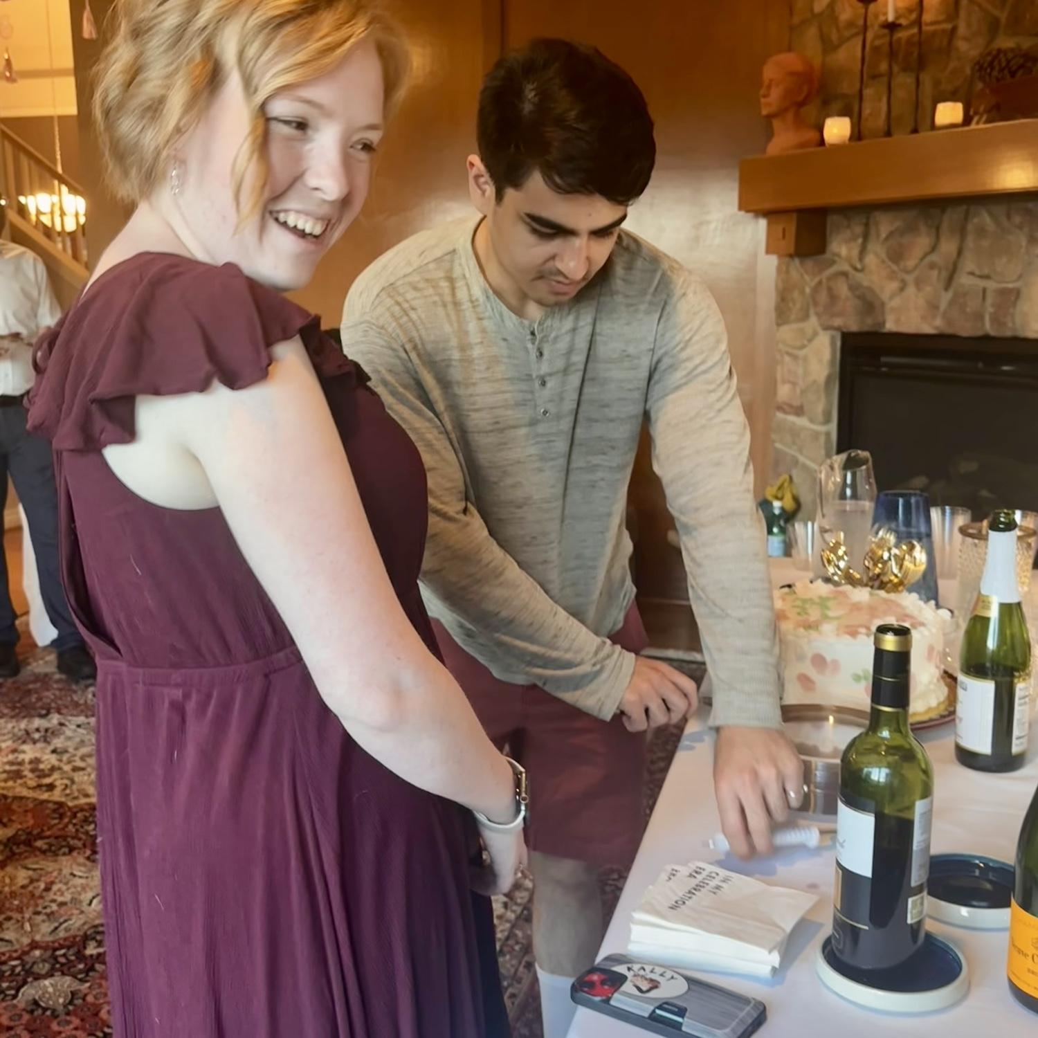 Cutting the cake at the engagement party!