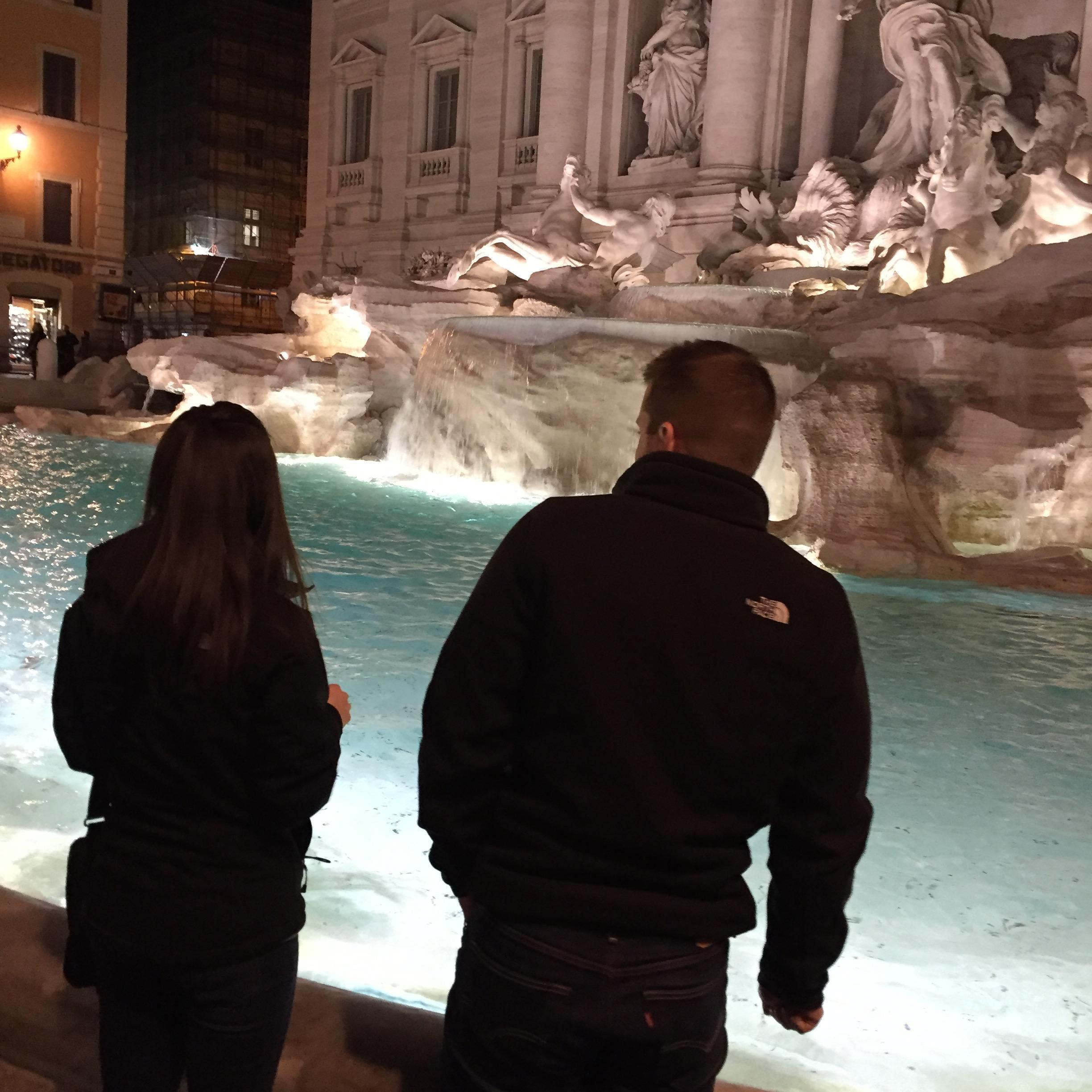 Tossing coins in the Trevi Fountain. 2016
