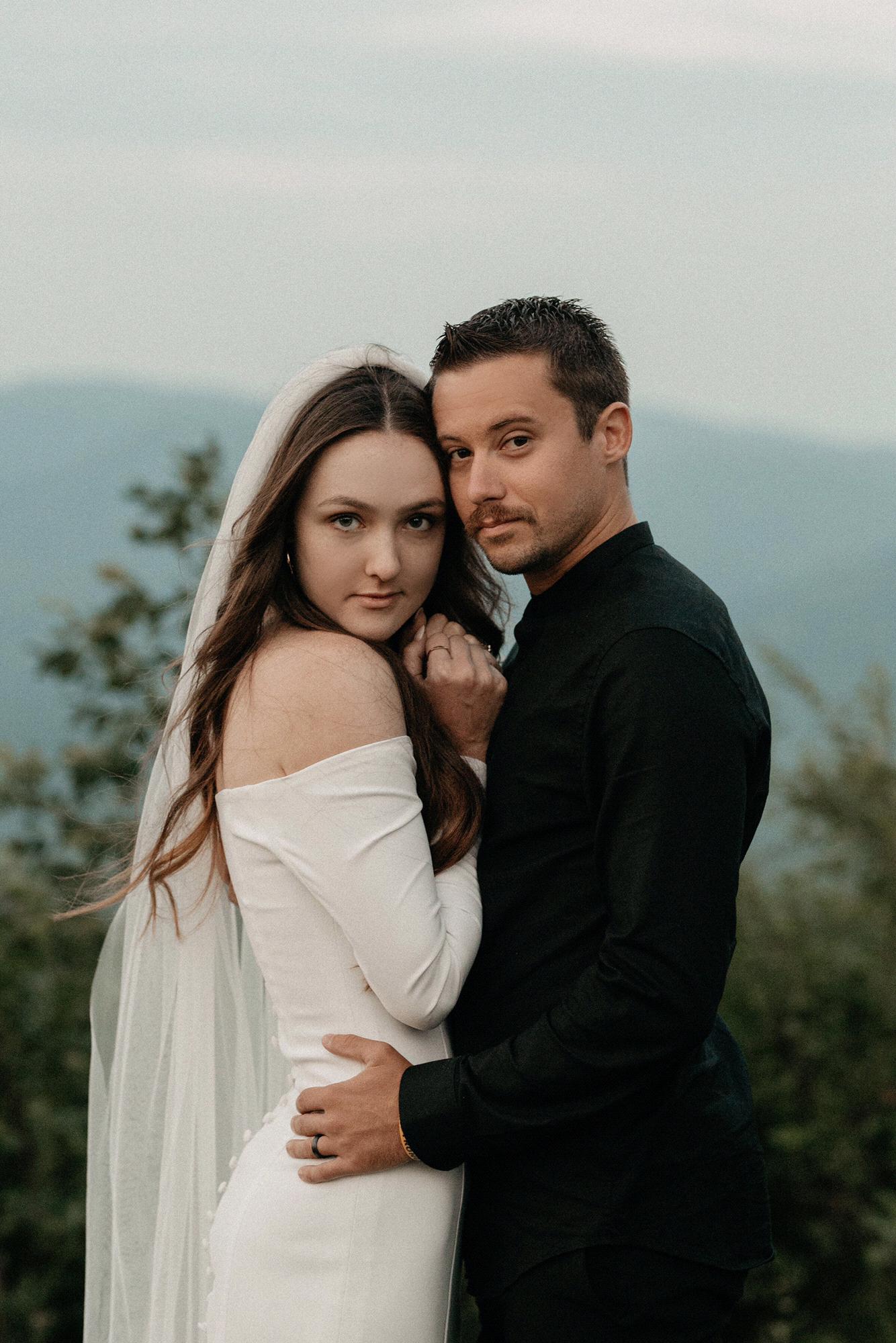 On our honeymoon we got up at 5am and put on our wedding duds to take these pictures!  White Oak Mountain in Asheville, NC.