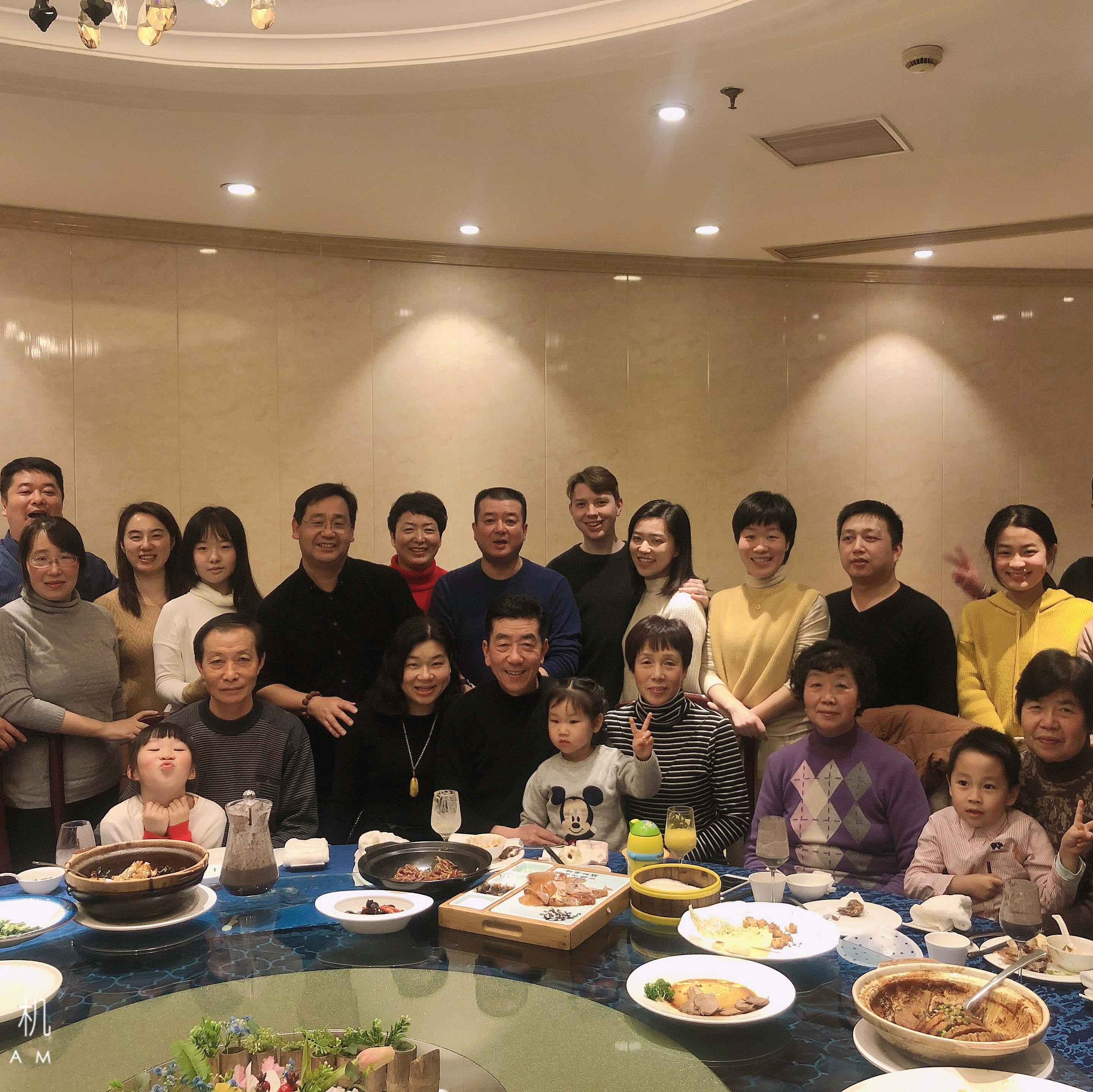 Us with Jamie's broader family. This was taken at a casual Chinese dinner table.
