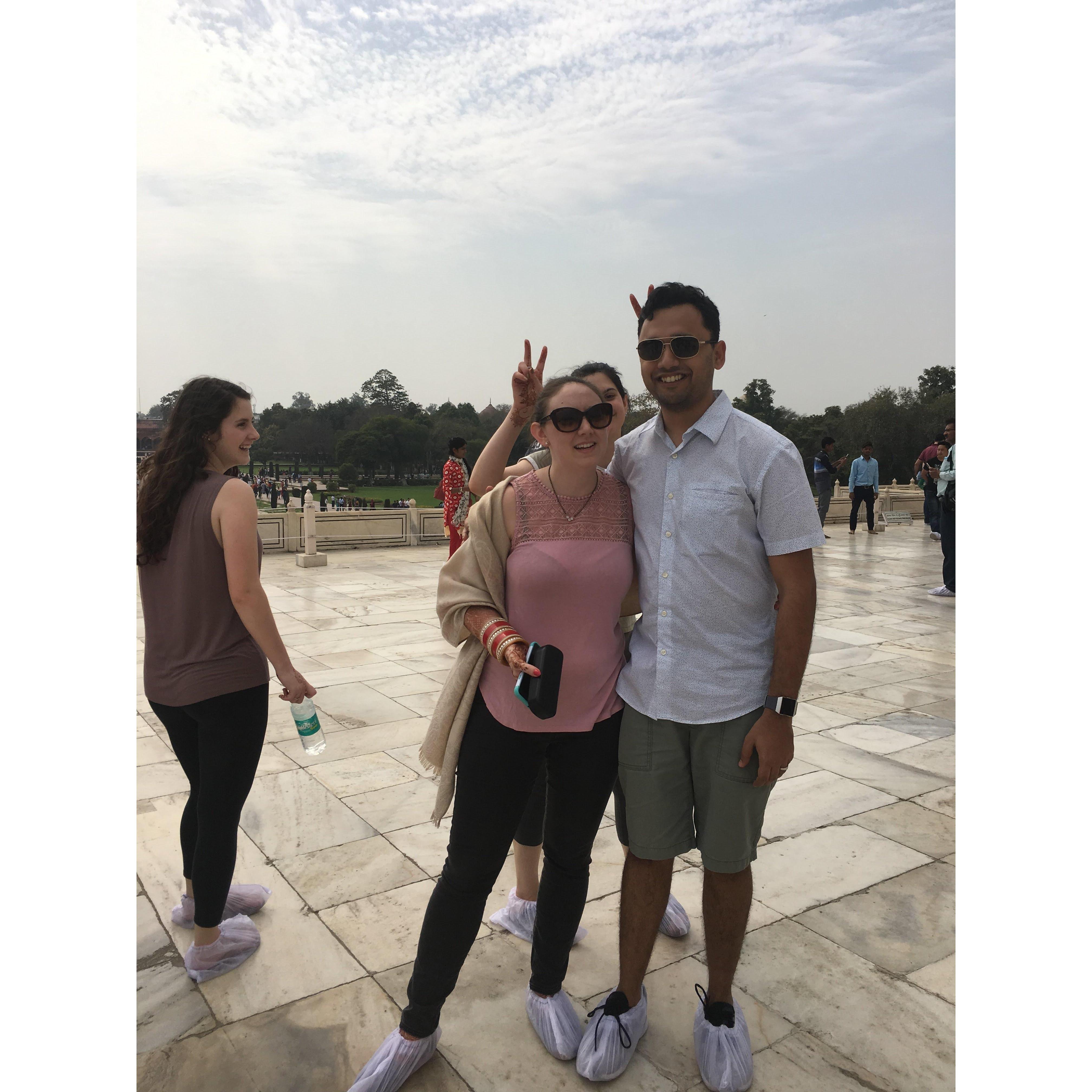 Us at the Taj Mahal with a photo bomb by Rachel and Sarai