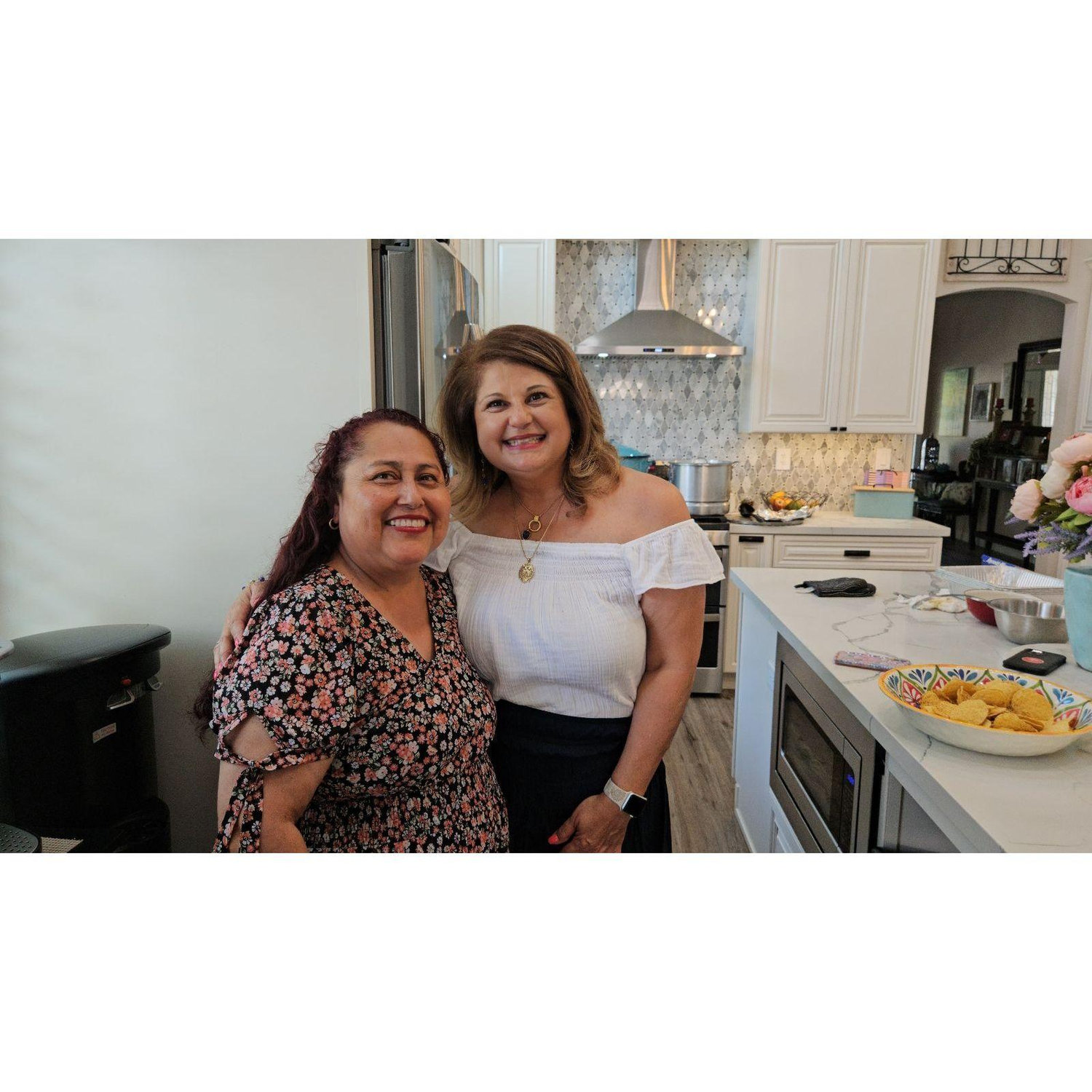 Señora Barrera & Señora Lopez in the kitchen at our engament party, June 2024.