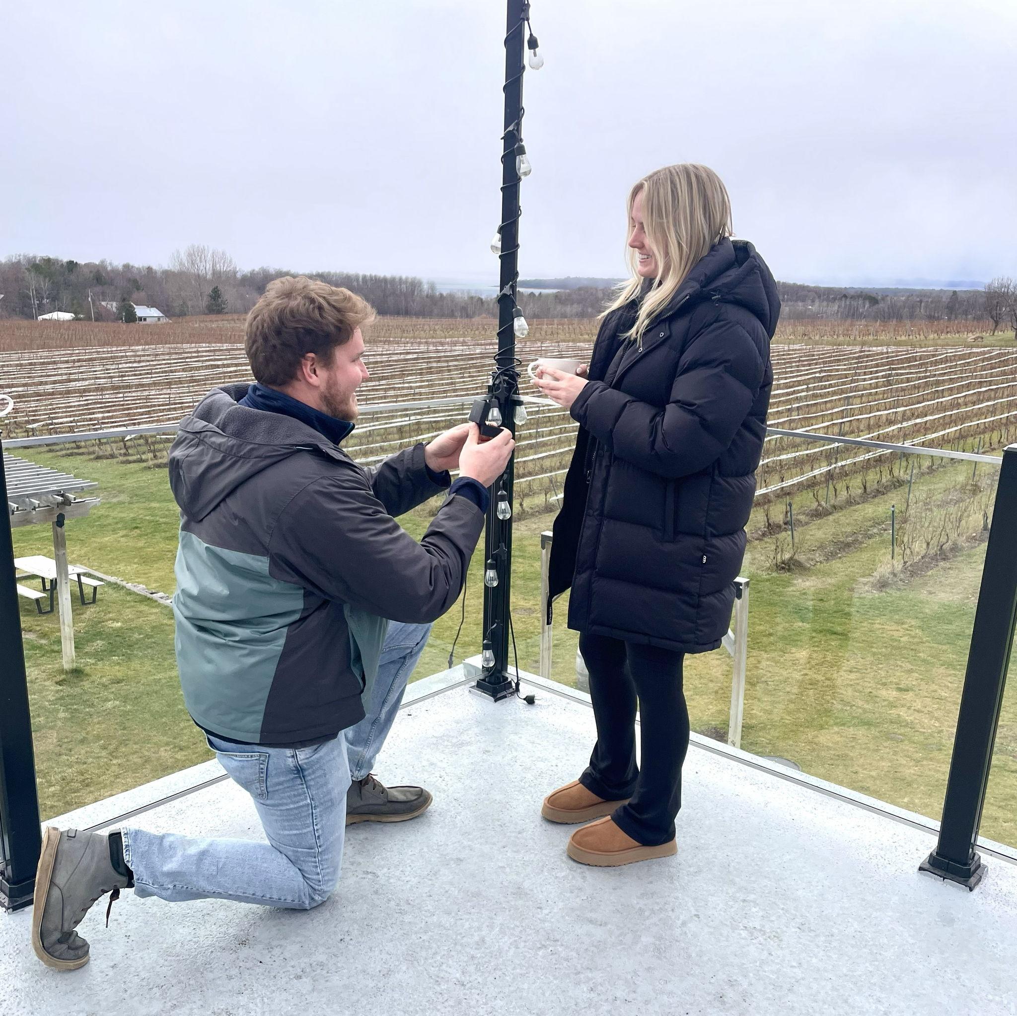 Will eventually set down his cocoa, got down on a knee, and said “I’ve been carrying this around all day looking for the perfect moment...will you marry me?” Tiffani was shocked and said YES.